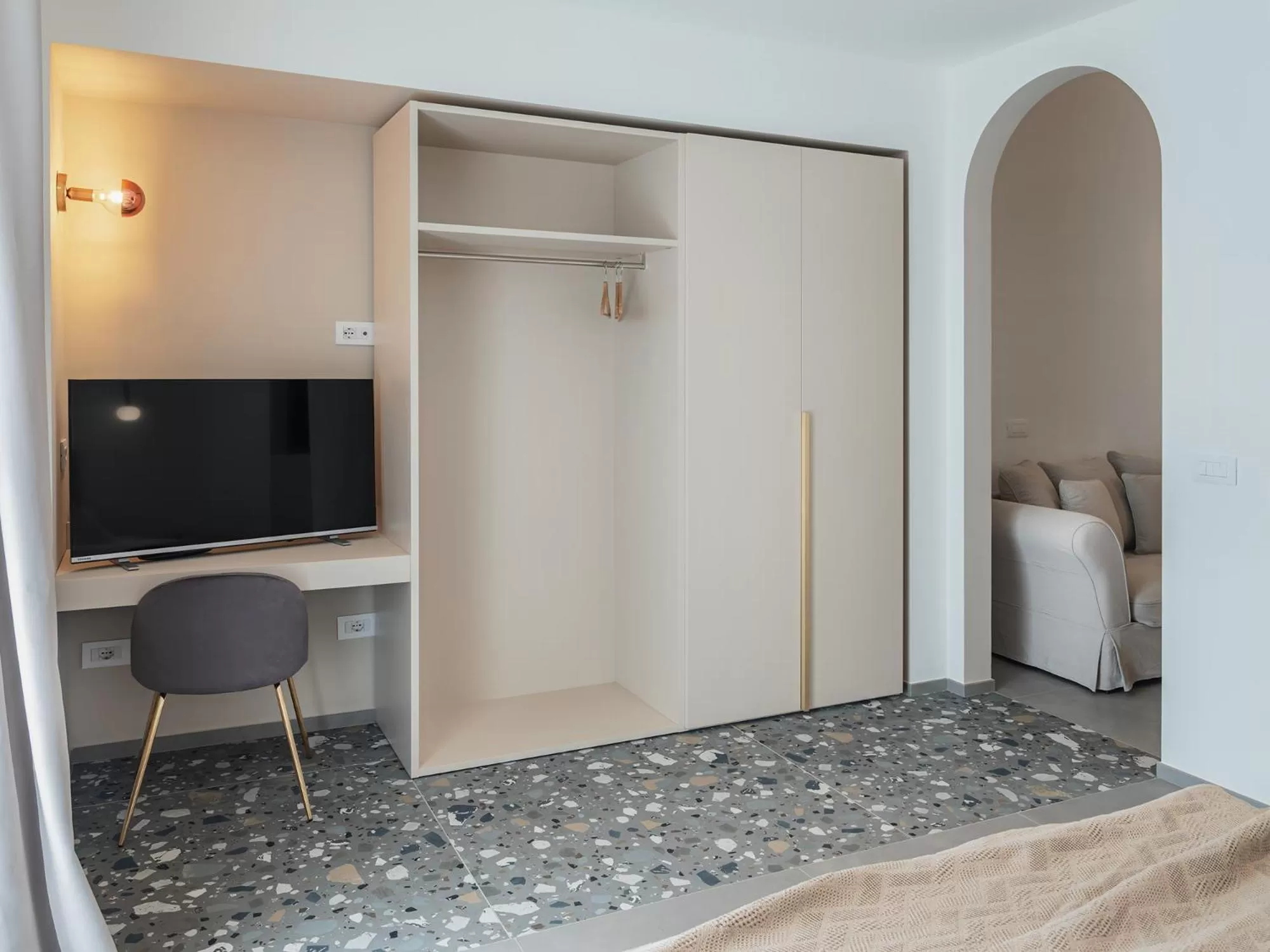 Bed in Living u HomeSuites