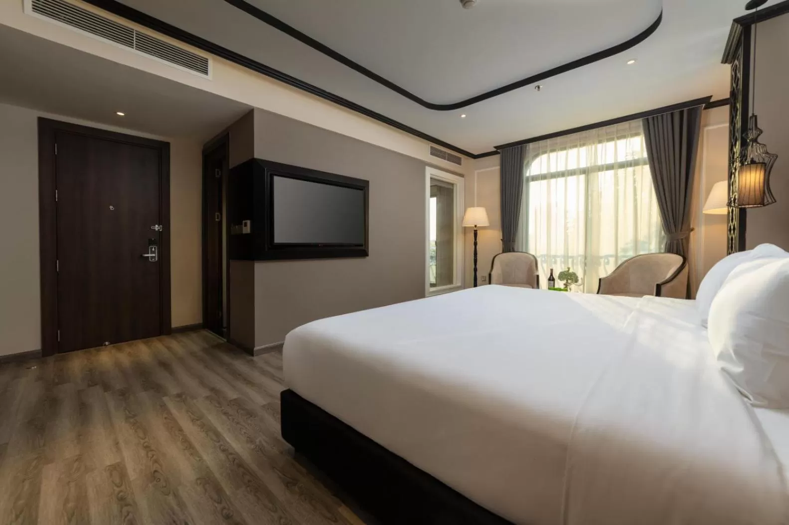 Communal lounge/ TV room, Bed in FTE Ba Dinh Hotel