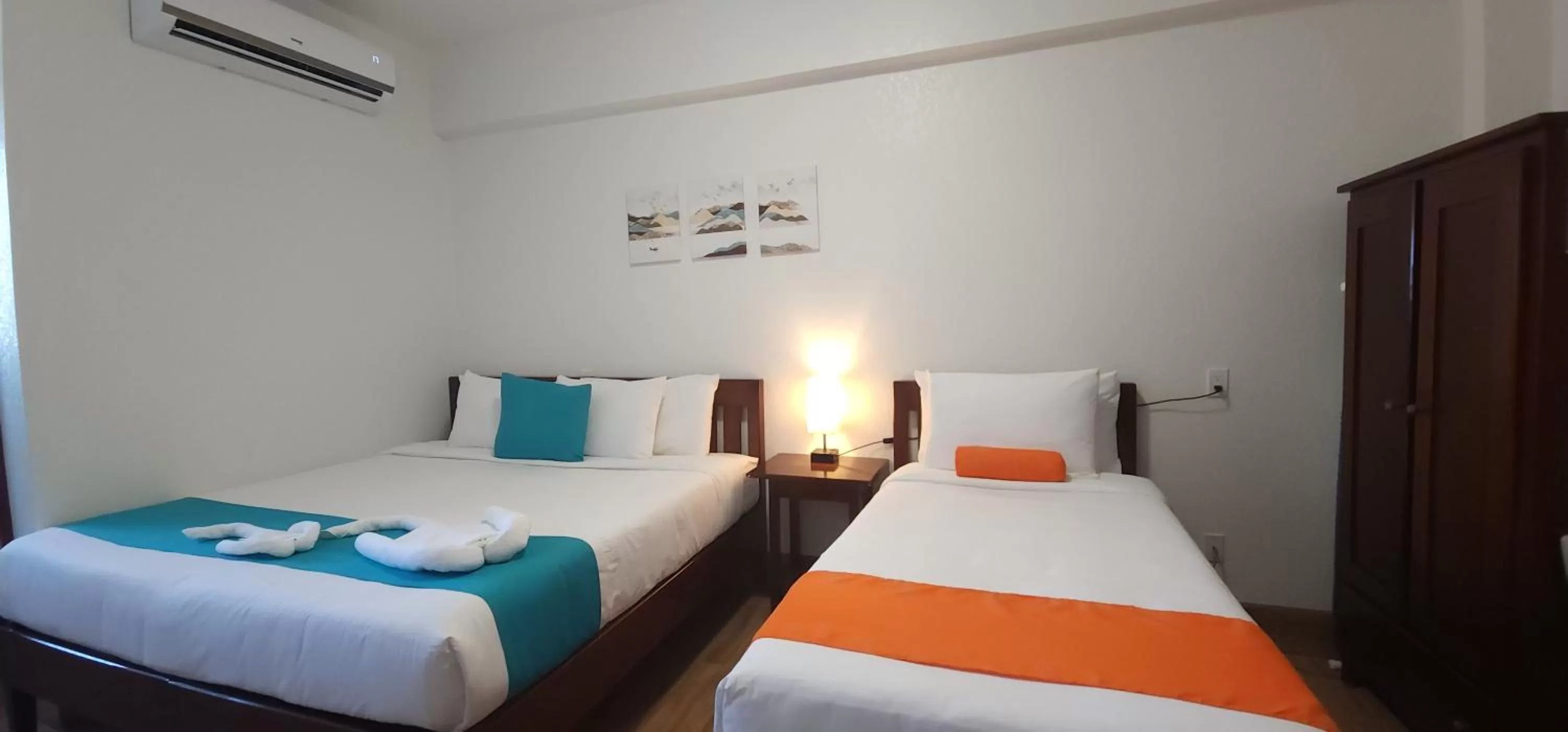 Bed in Voyager Sun & Reef Hotel