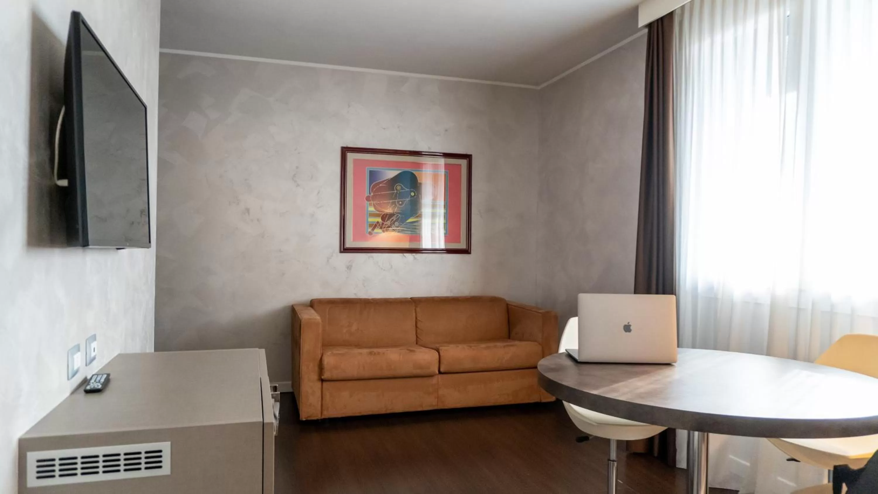 Seating area in AMEDIA Hotel