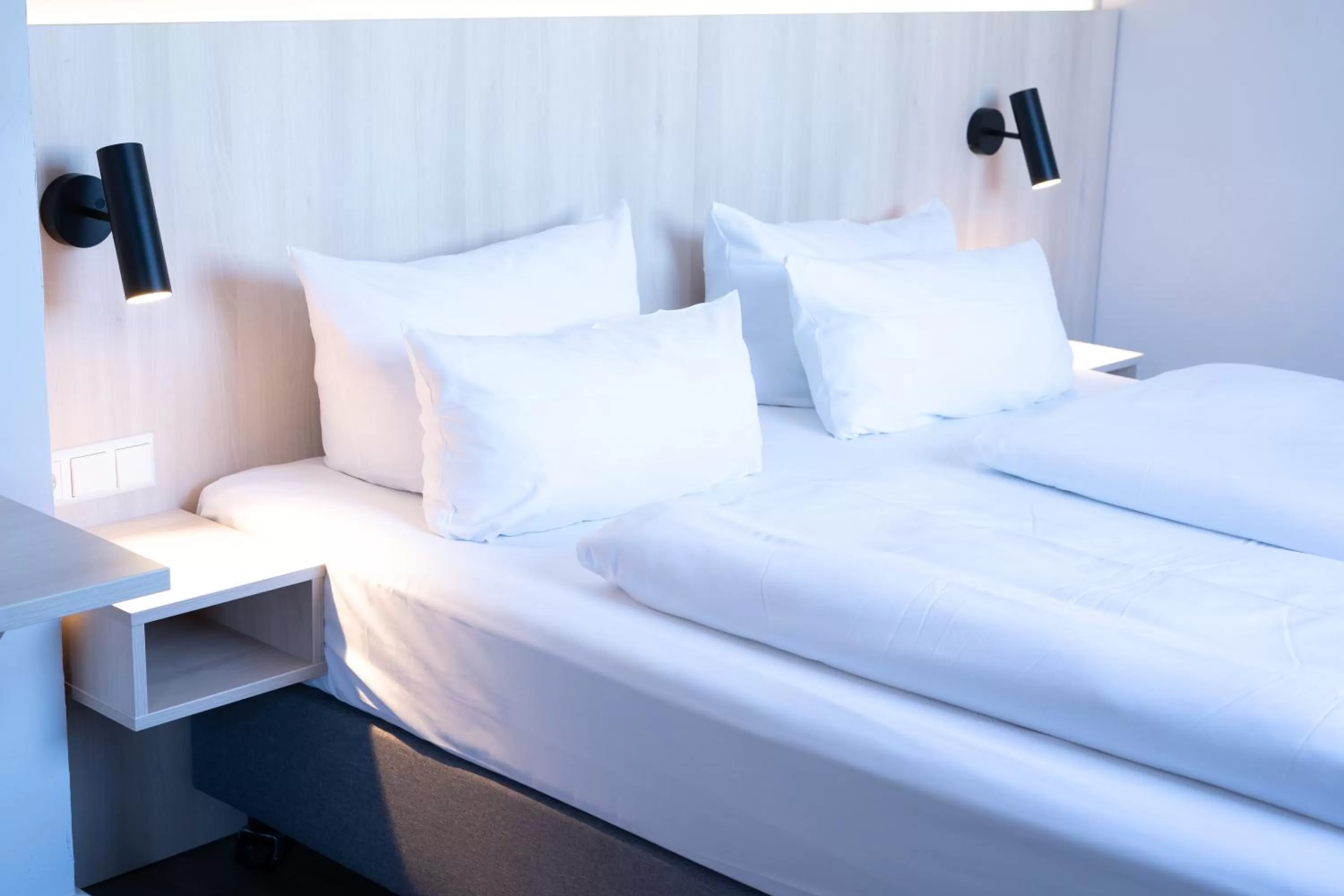 Photo of the whole room, Bed in Taste Hotel Hockenheim