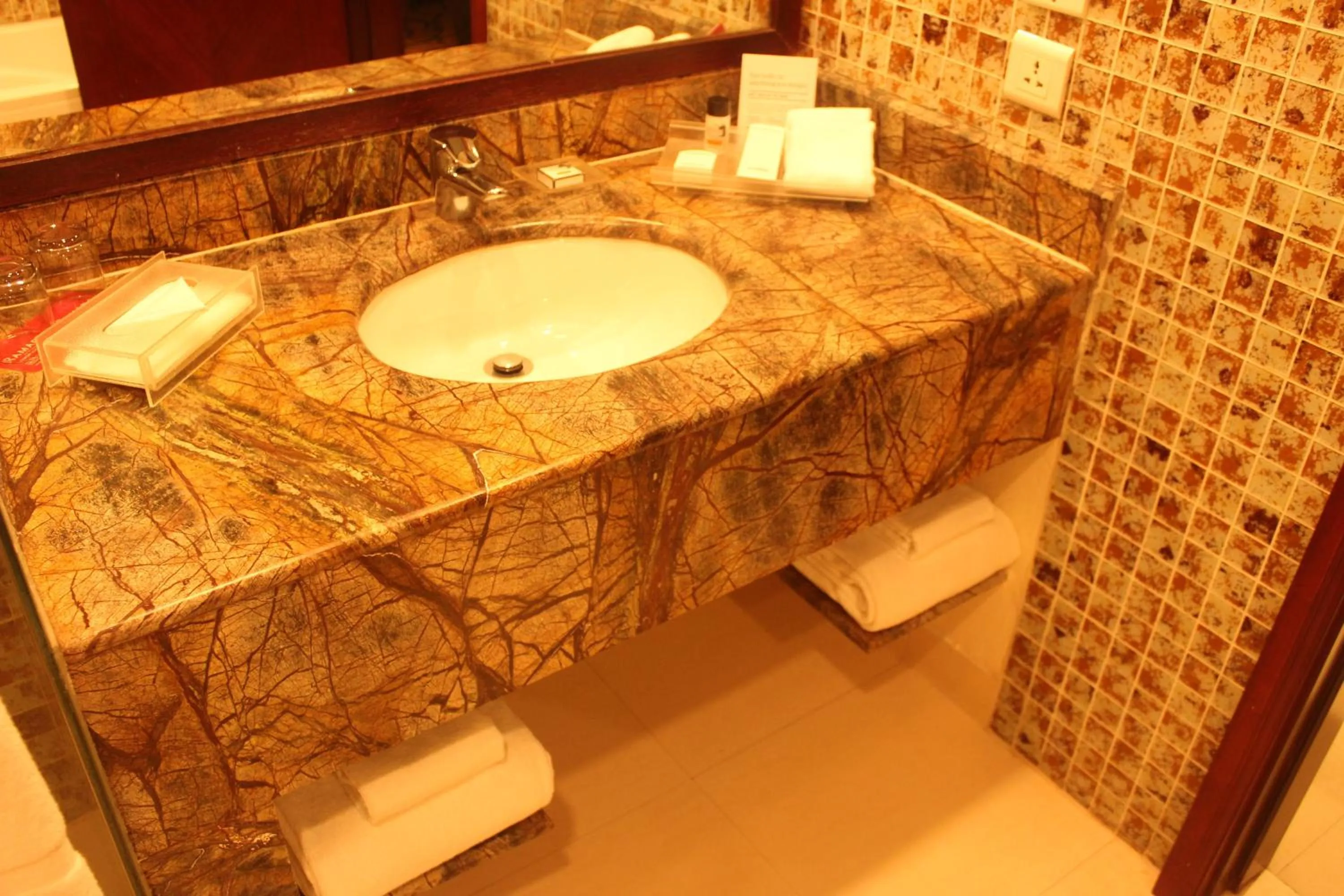 Bathroom in Ramada by Wyndham Jaipur Jaisinghpura