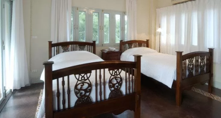 Bed in Villa Duangchampa