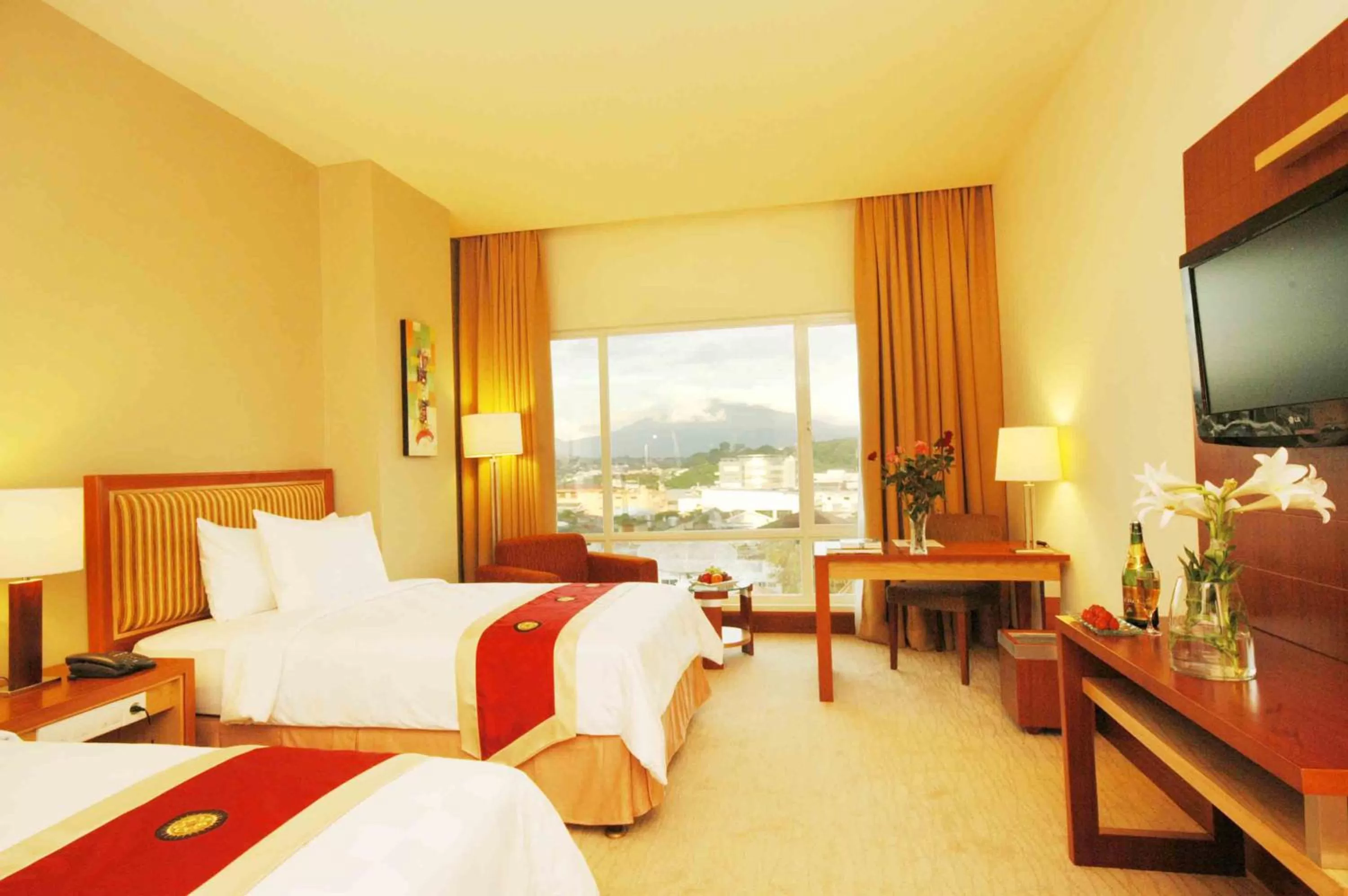 Photo of the whole room, Bed in Swiss-Belhotel Maleosan Manado