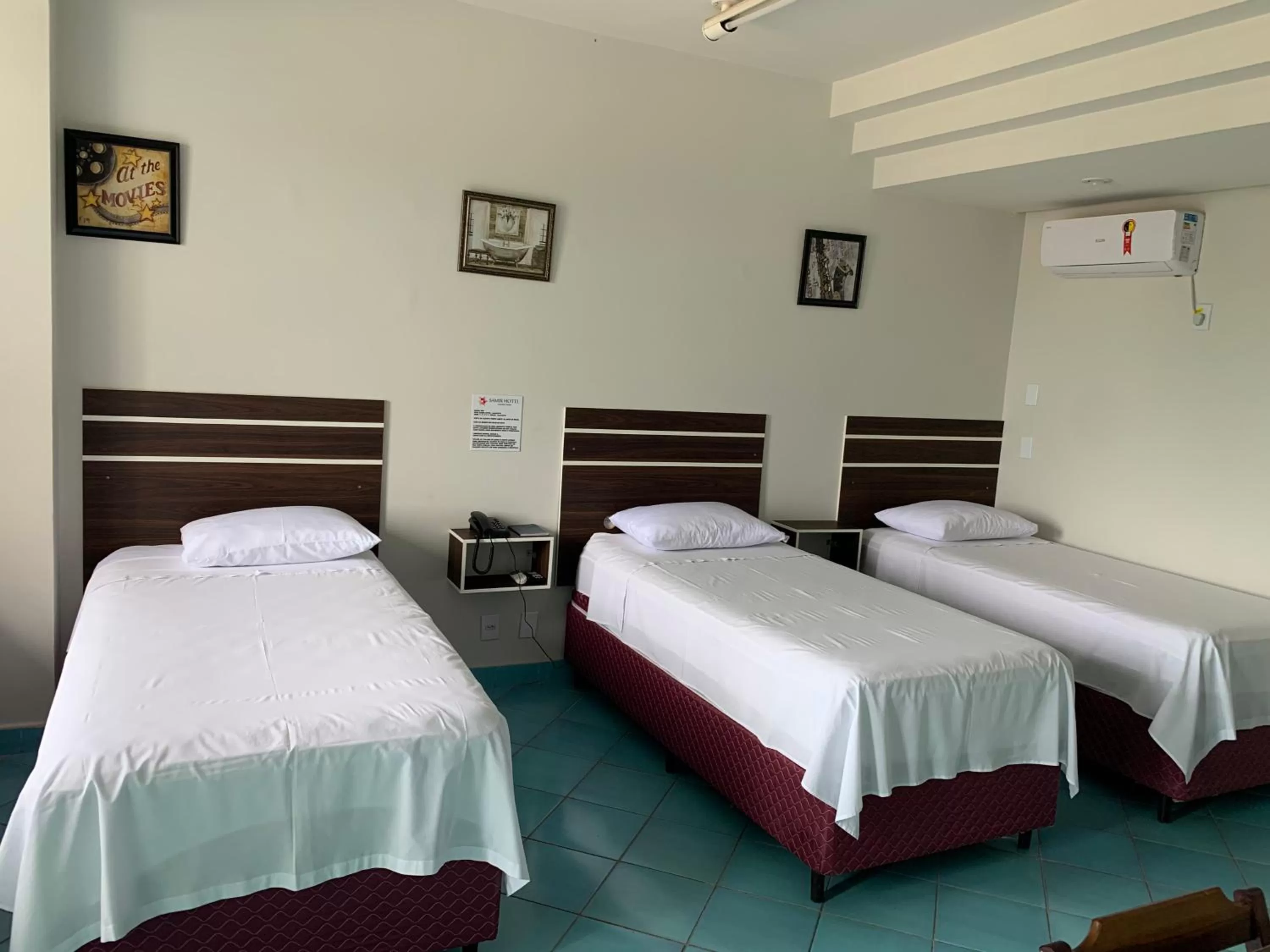 Bed in SAMIR HOTEL COMFORT