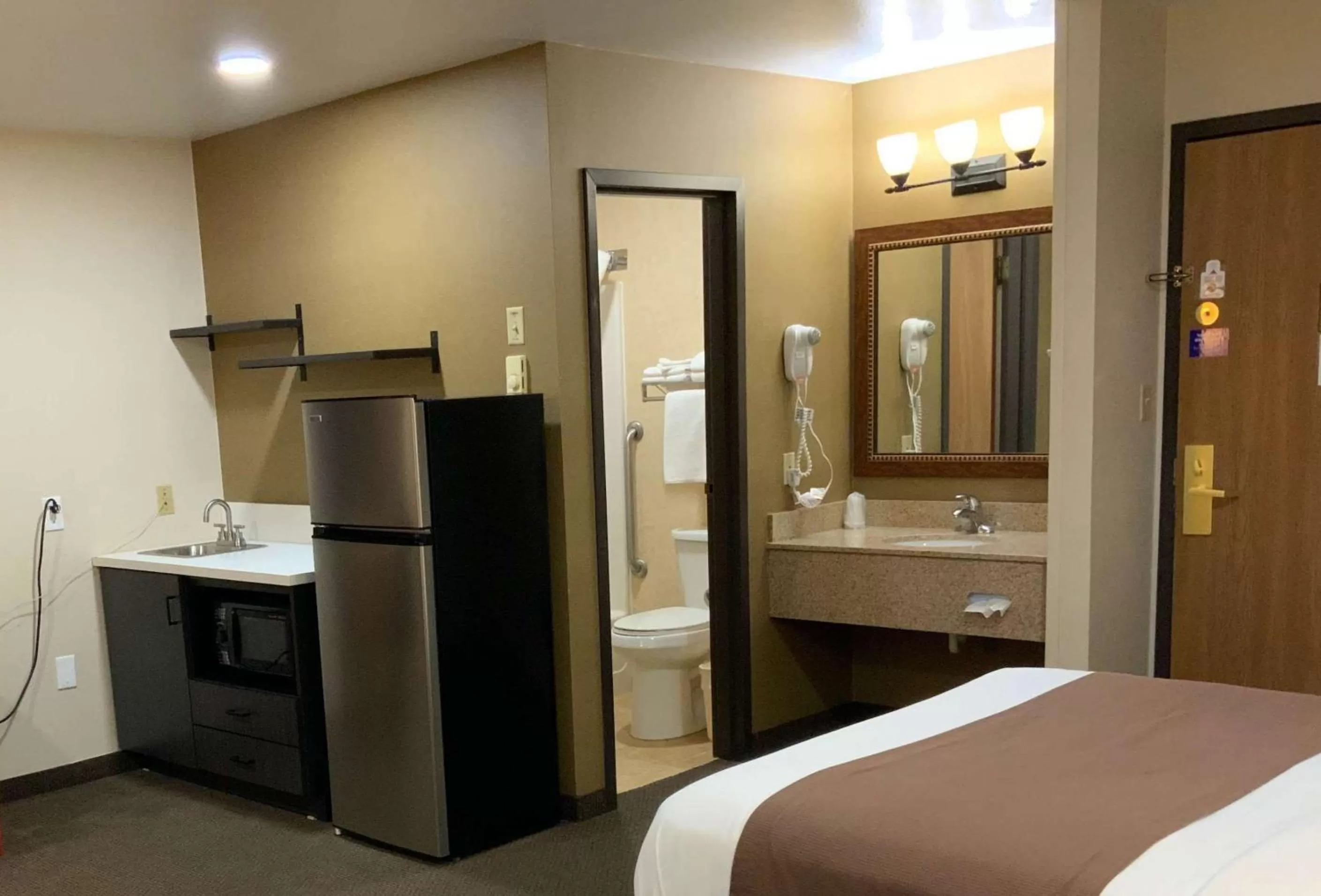 Bathroom, Bed in Studio 6 - Minot, ND