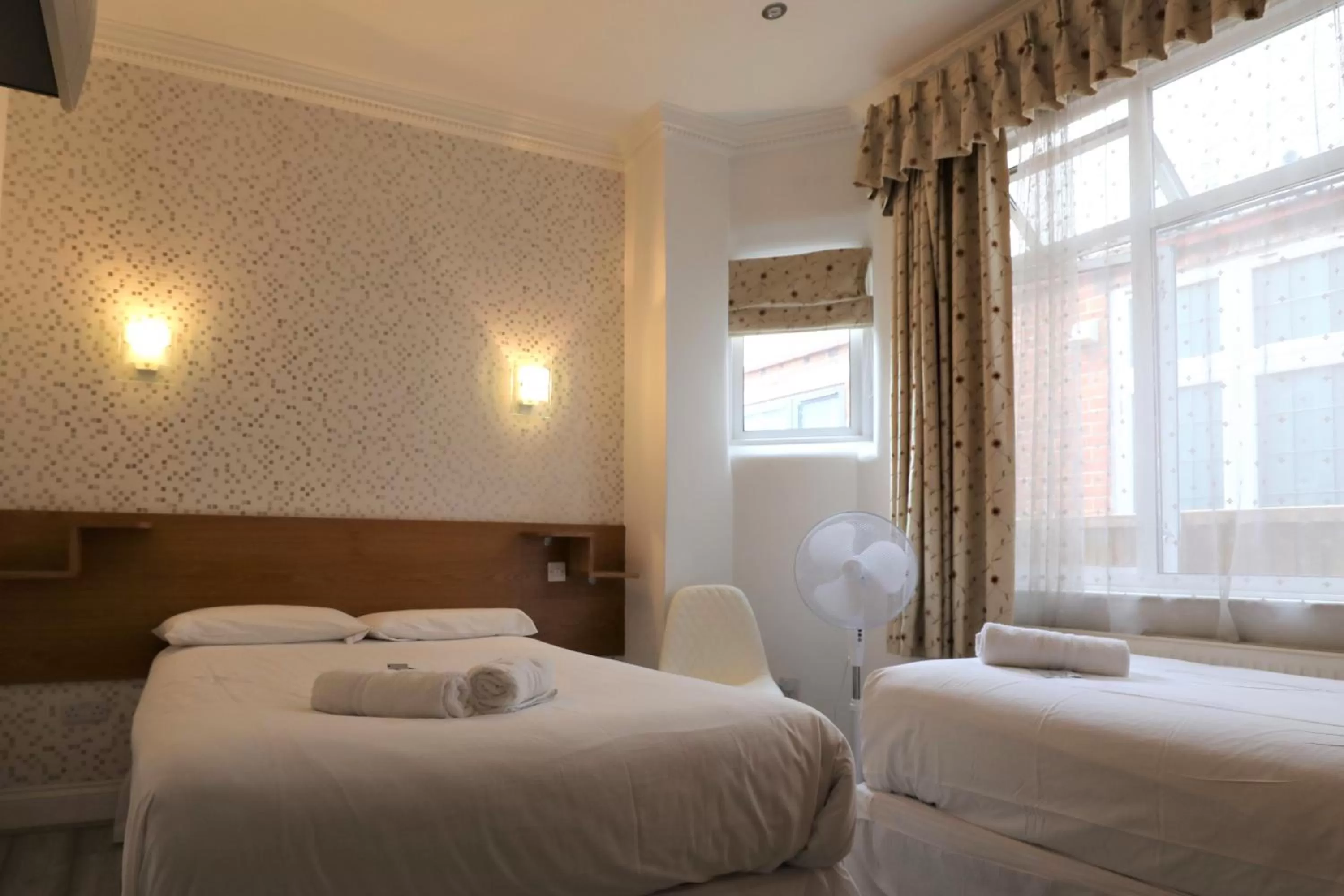 Bed in Anchor Guest House