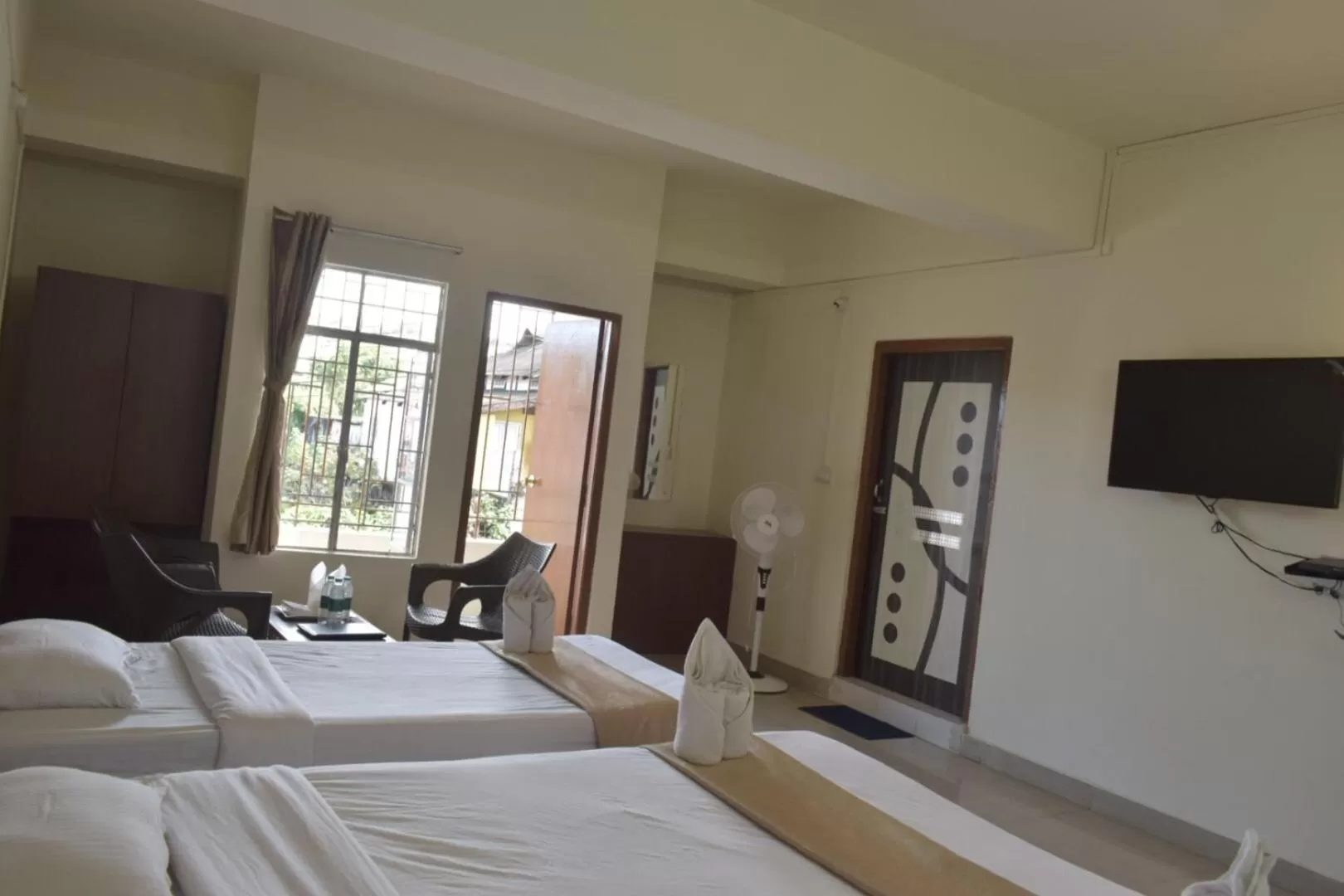 Bed in Hotel Travellers INN