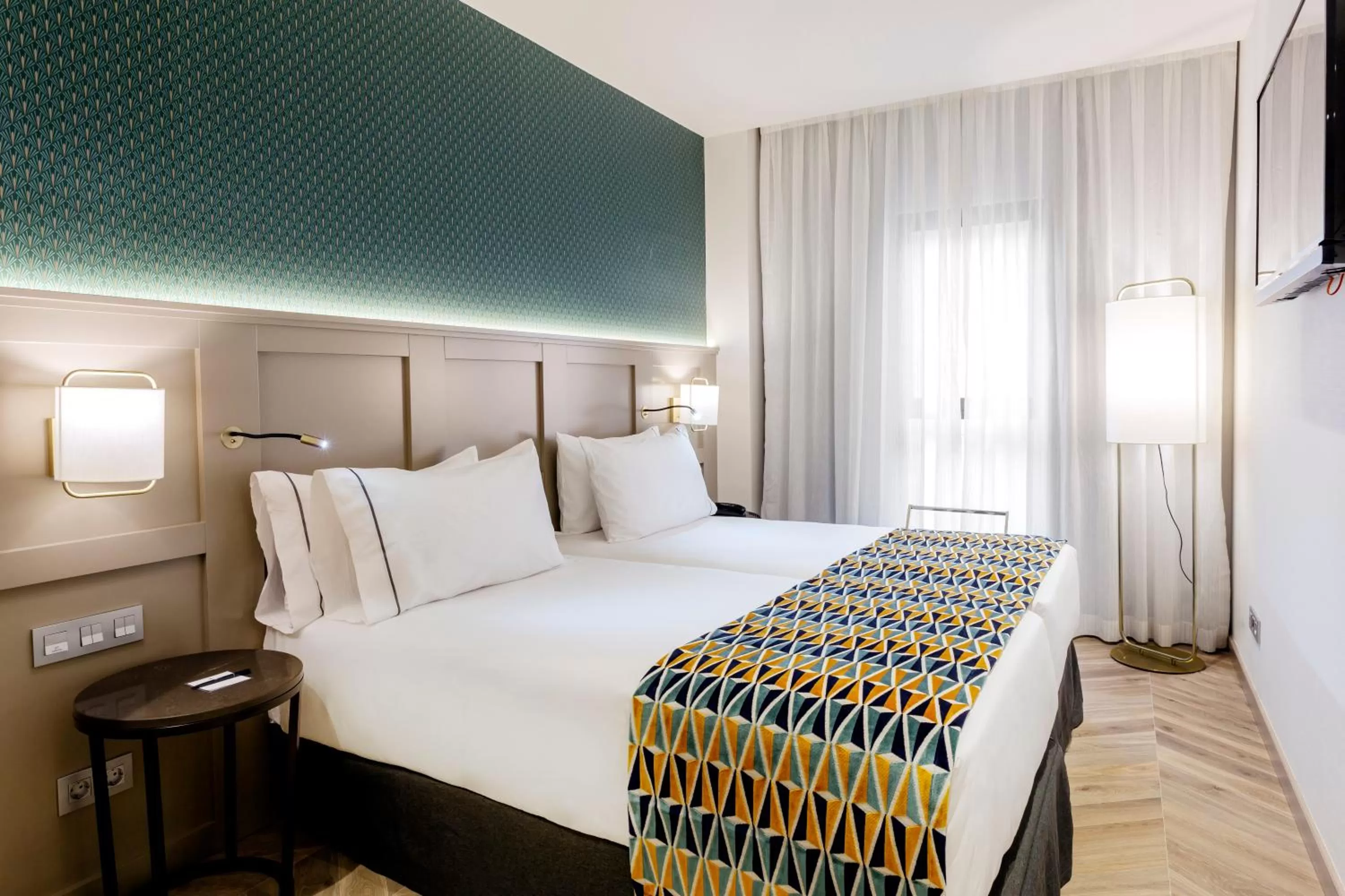 Photo of the whole room, Bed in Eurostars Puerta Real
