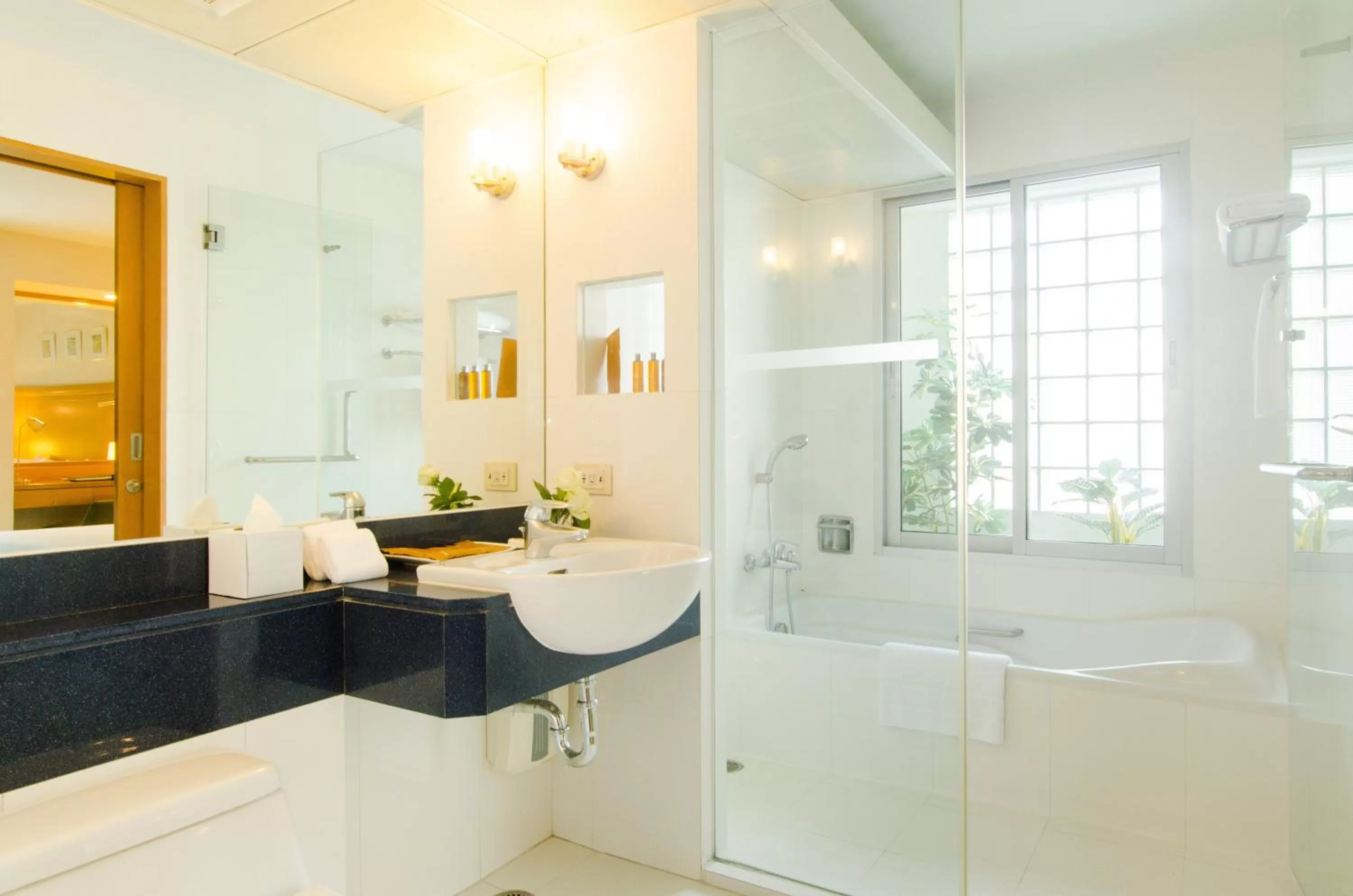 Bathroom in AT EASE saladaeng by AETAS