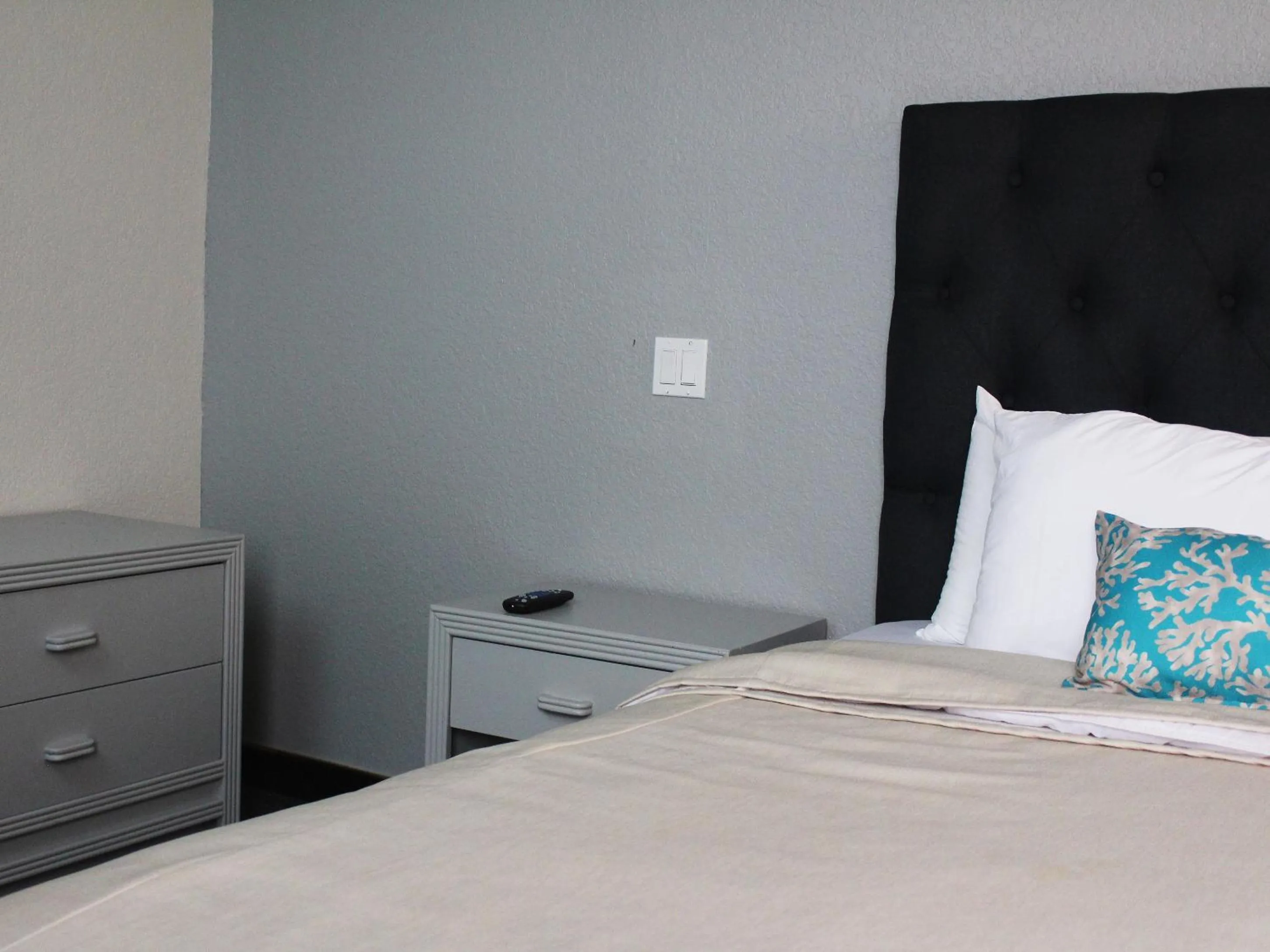 Bed in Hotel Corona Plaza