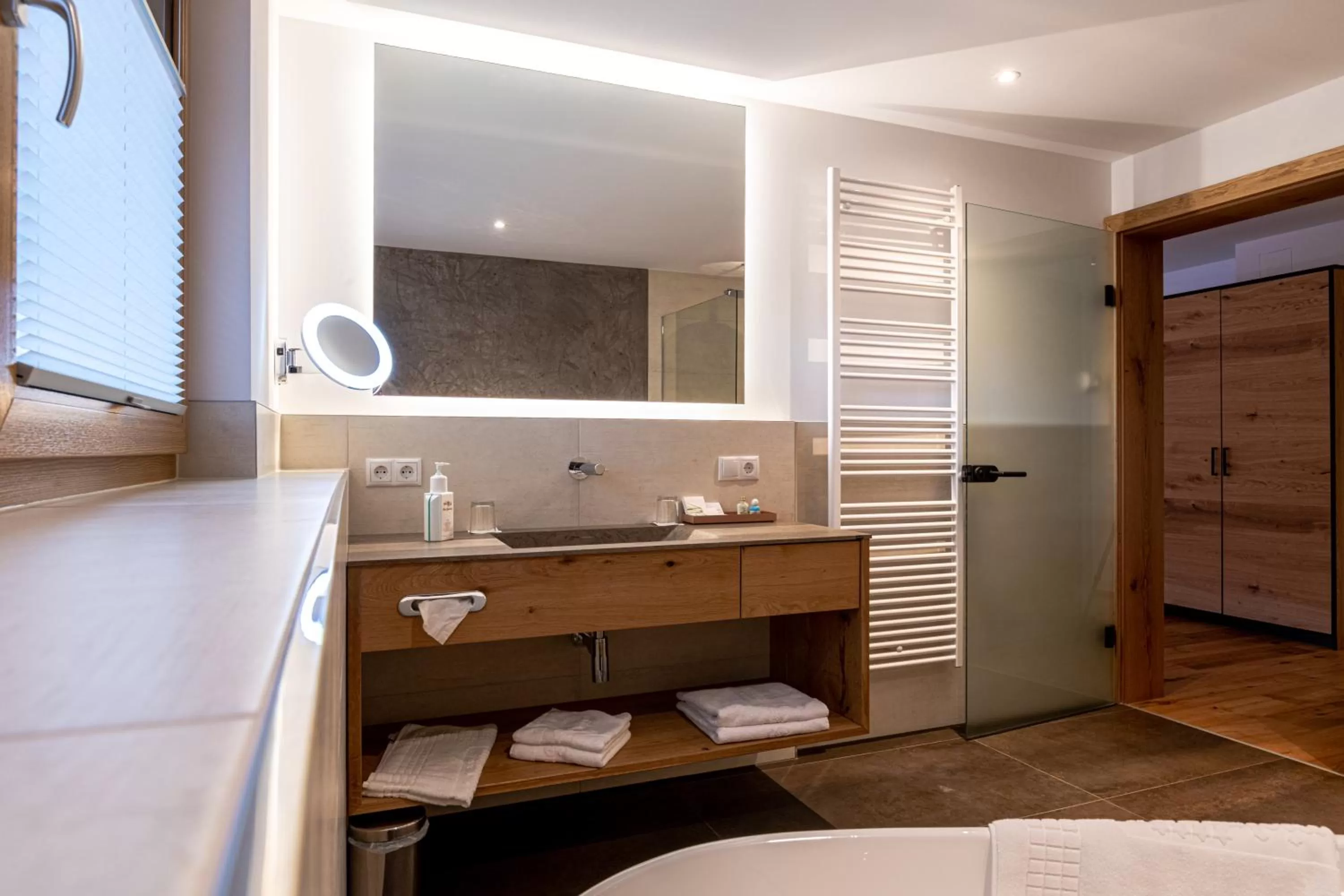 Bathroom, Bed in Hotel Spielmann