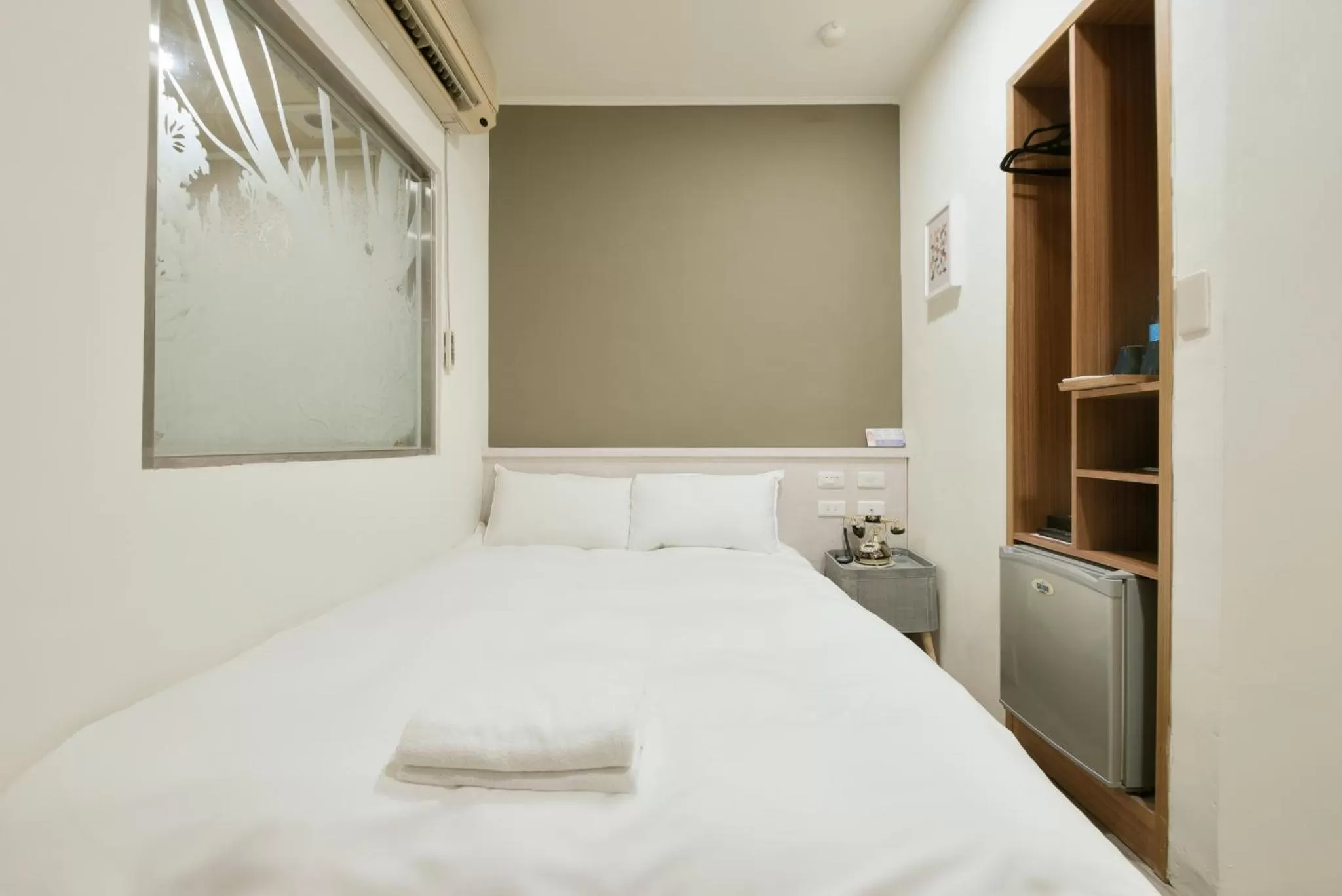 Bed in Raise Hotel Taichung