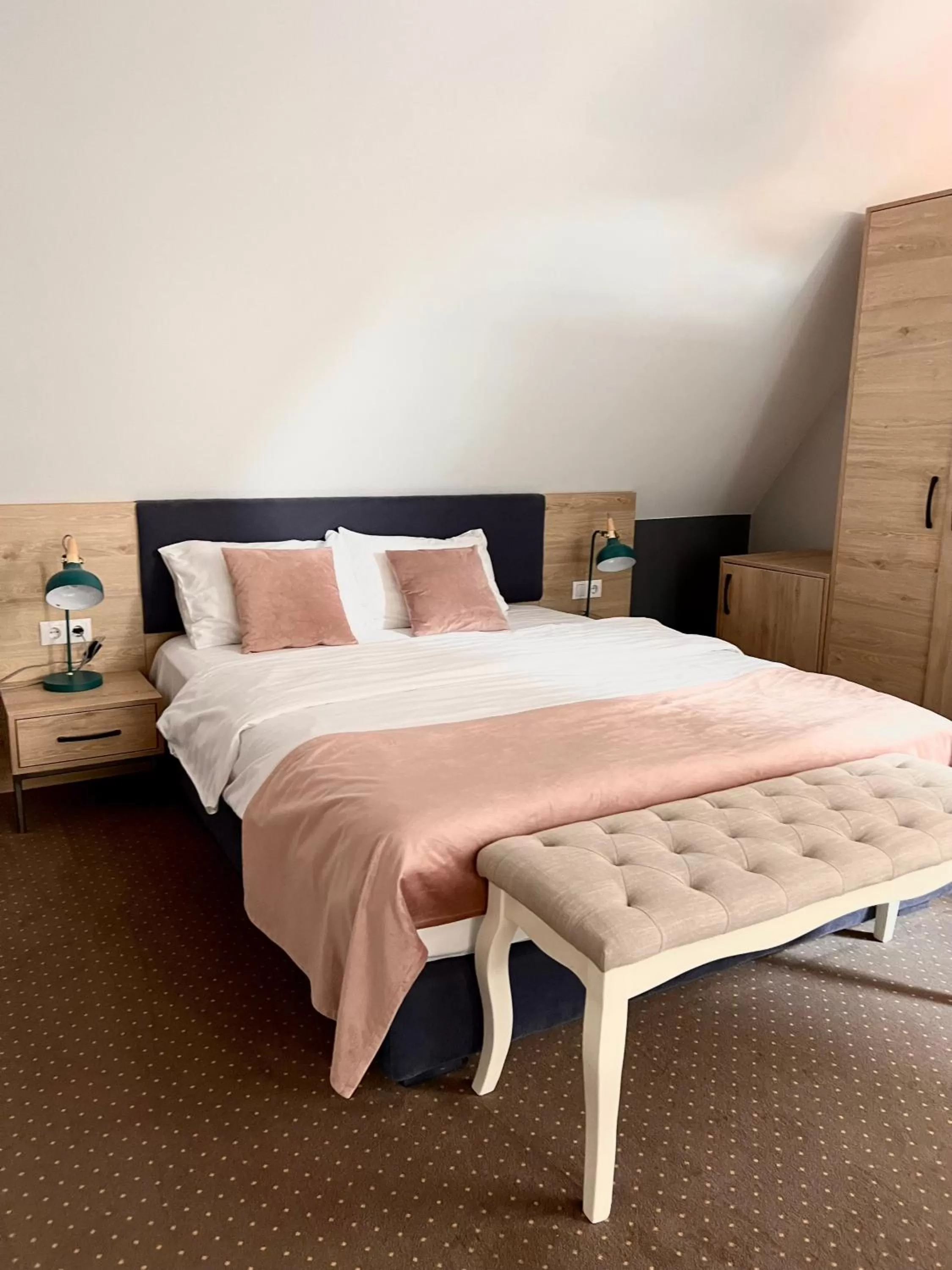 Bed in Lumiere House Sibiu