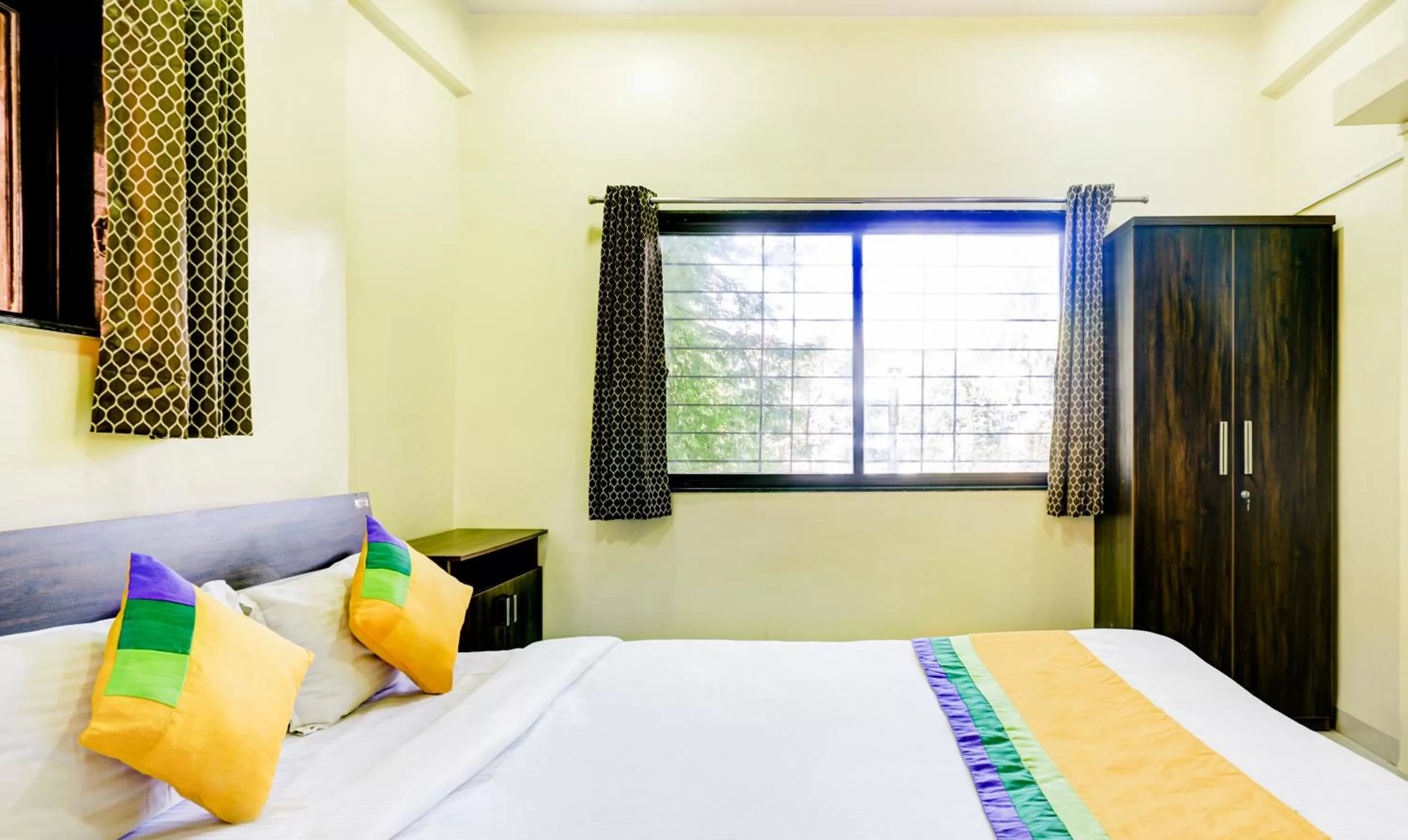 Photo of the whole room, Bed in Hotel Bestow Inn Koregaon Park Pune -Near Osho Ashram