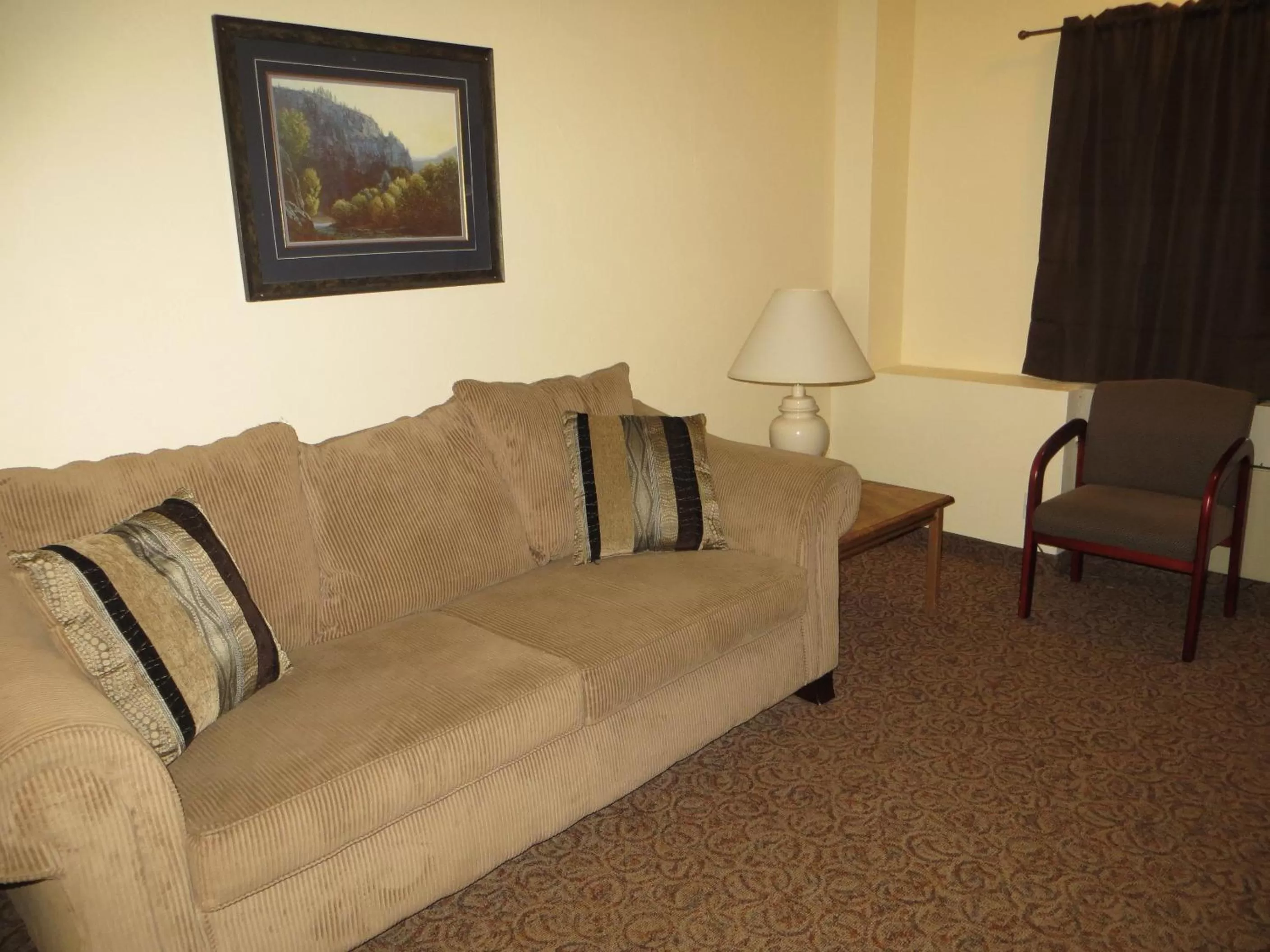 Living room in Baymont by Wyndham Spearfish