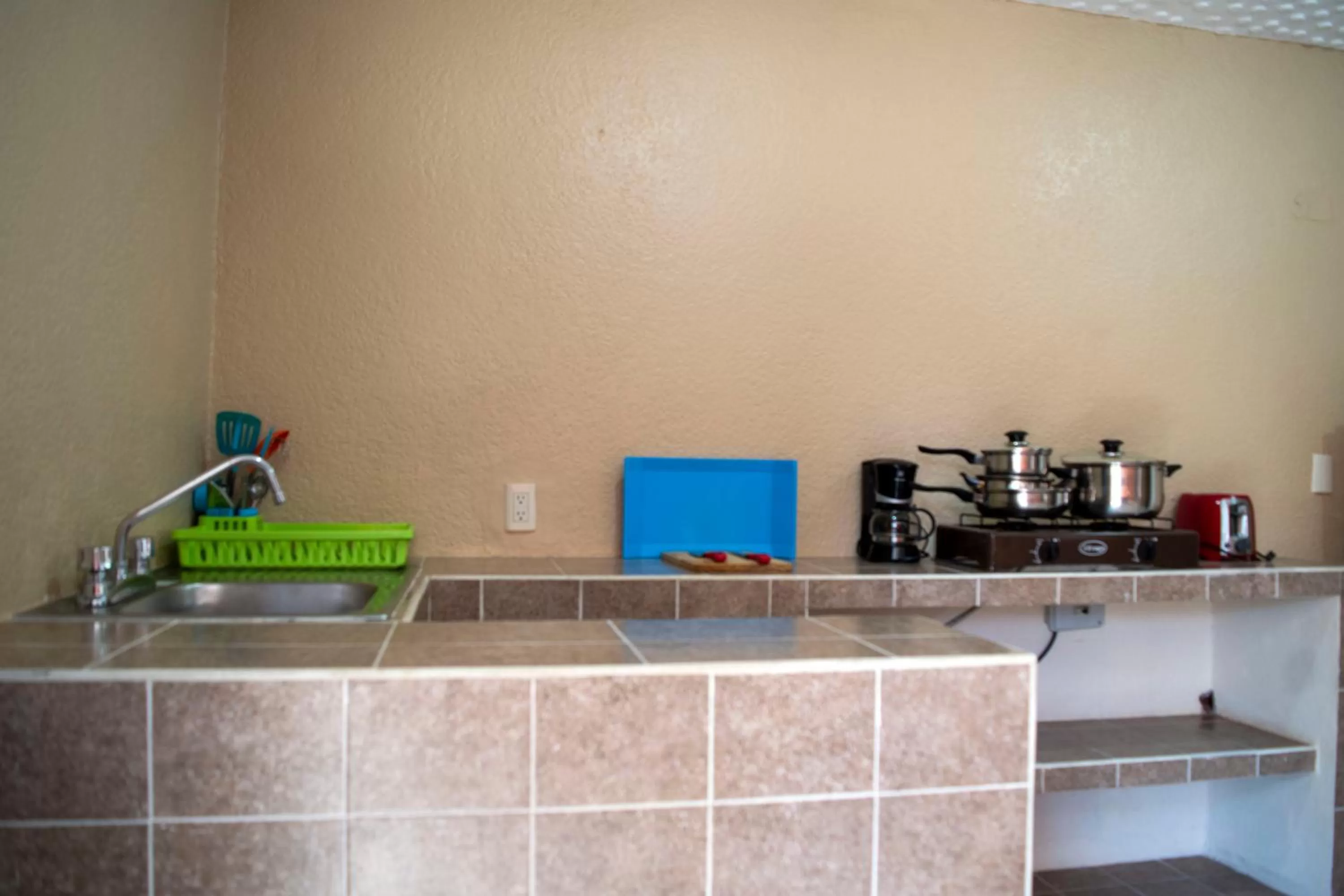 Kitchen or kitchenette in Isabel Suites