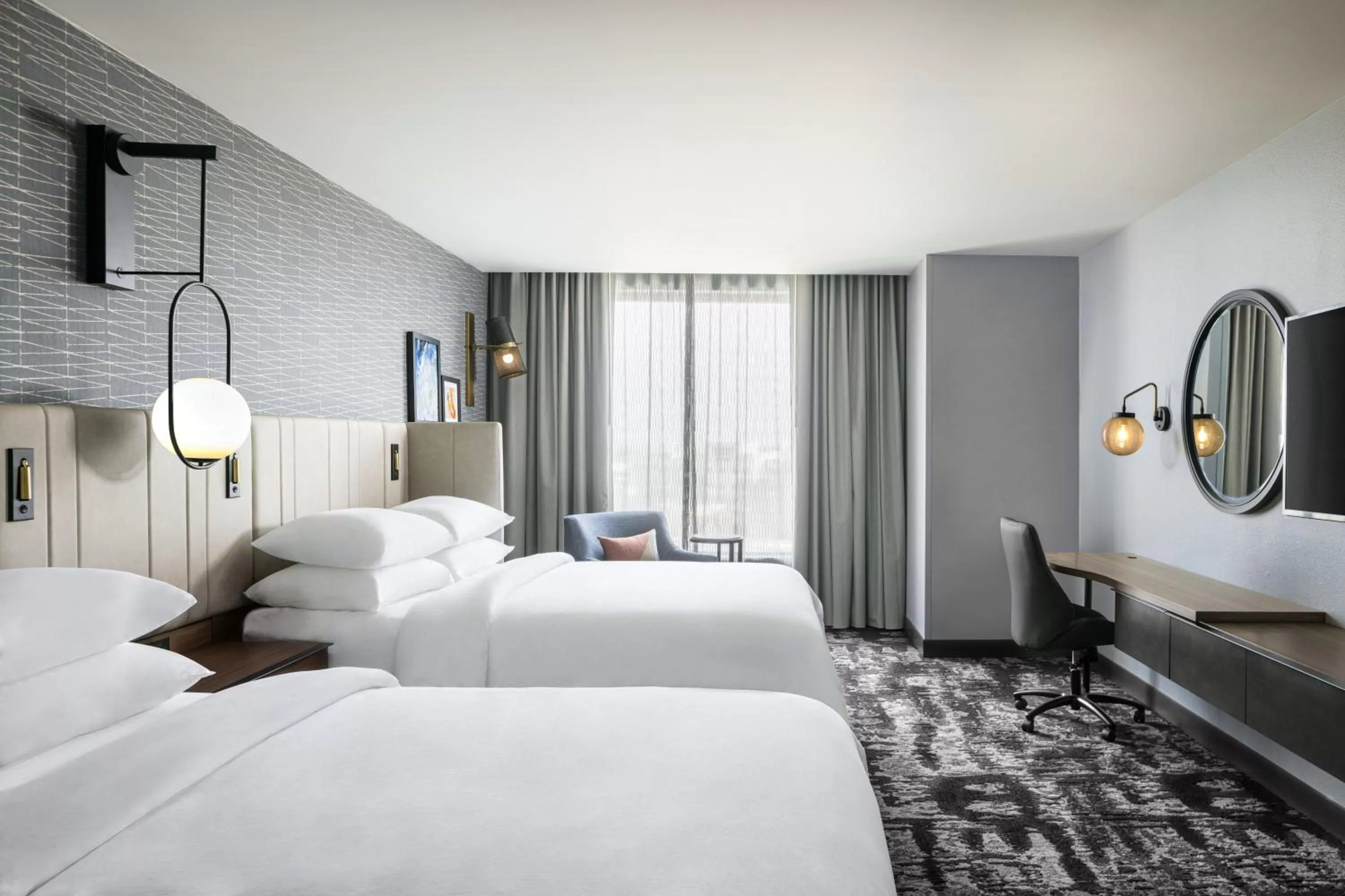 Queen Room with Two Queen Beds and Communications Accessible Tub in Crowne Plaza - Kearney, an IHG Hotel