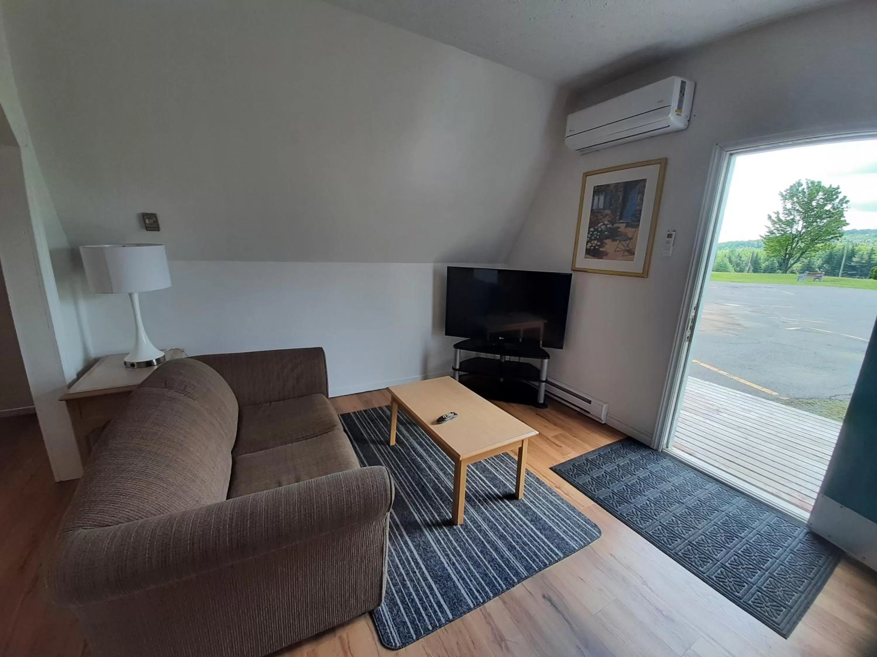 Living room in Howard Johnson by Wyndham Woodstock NB