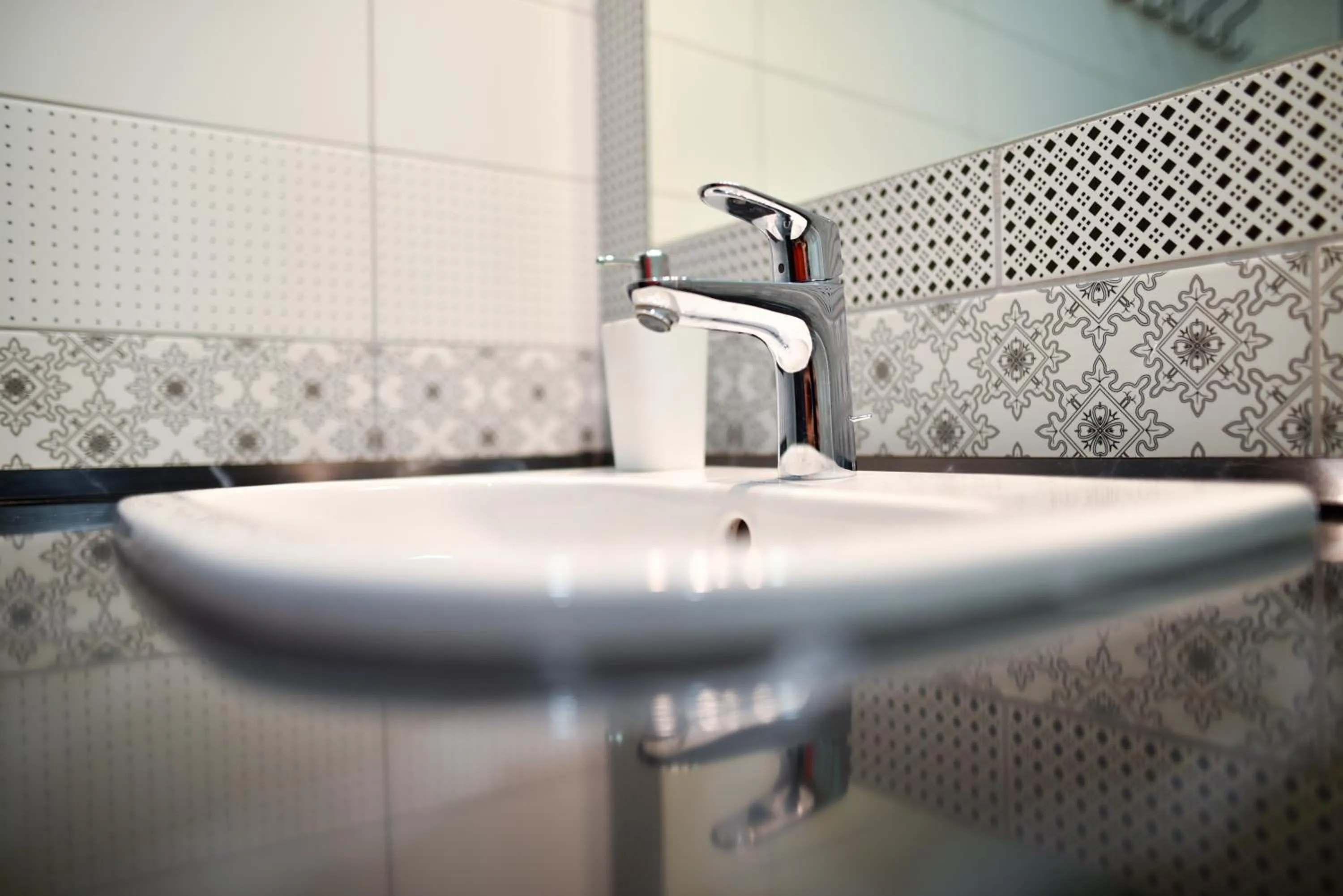 Bathroom in Corvin Point Rooms and Apartments
