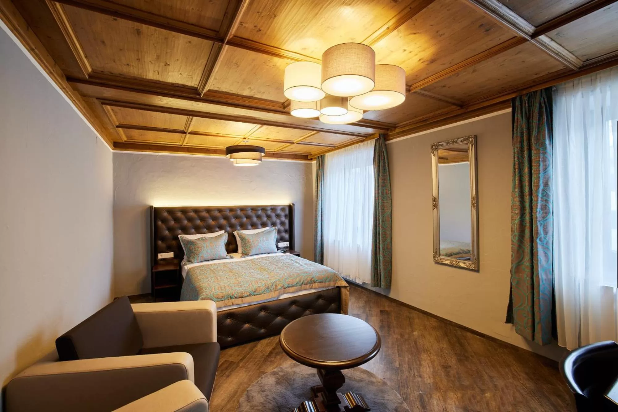 Bedroom, Seating Area in Atlas Posthotel
