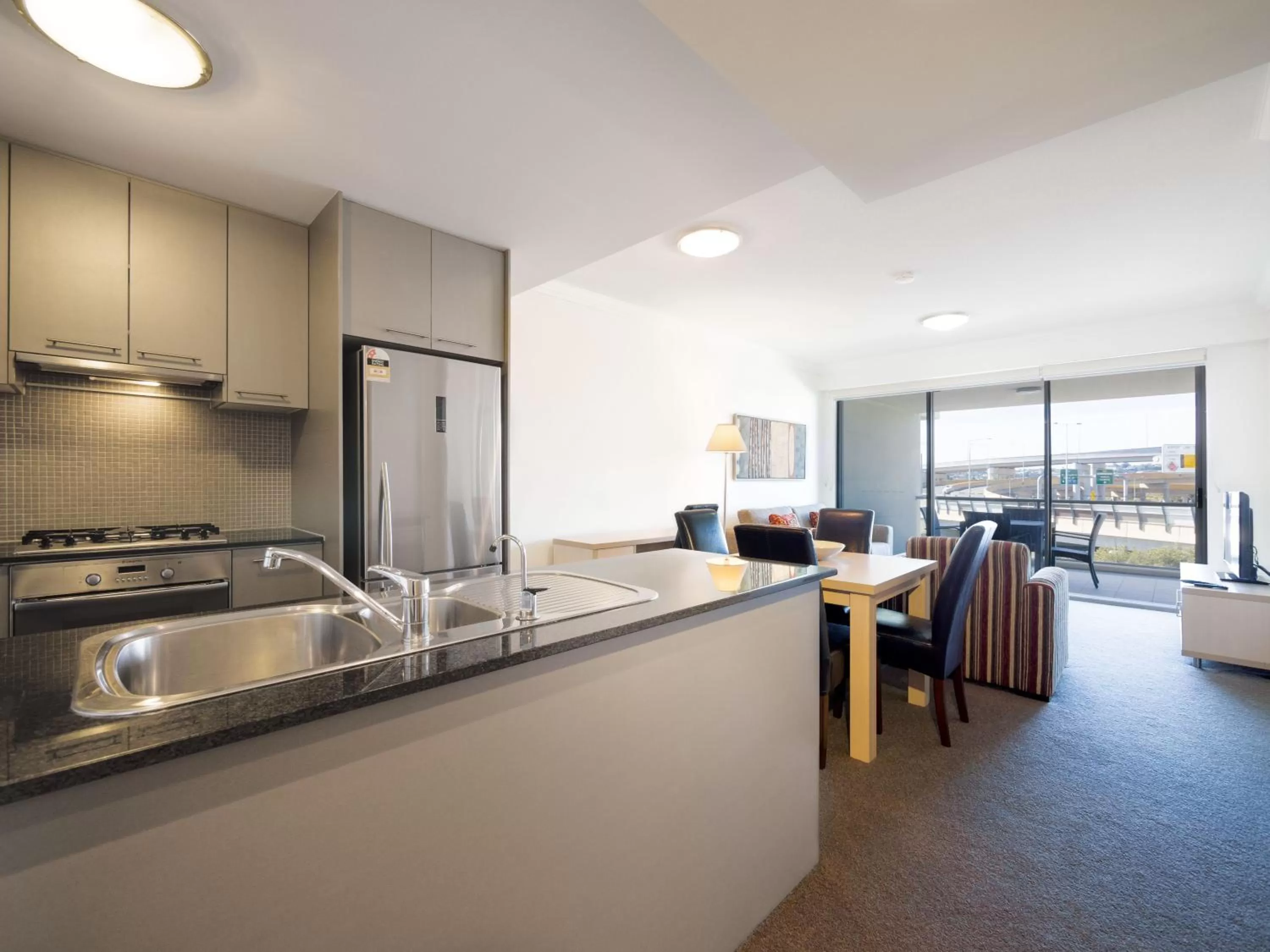 Kitchen or kitchenette in Oaks Brisbane Mews Suites