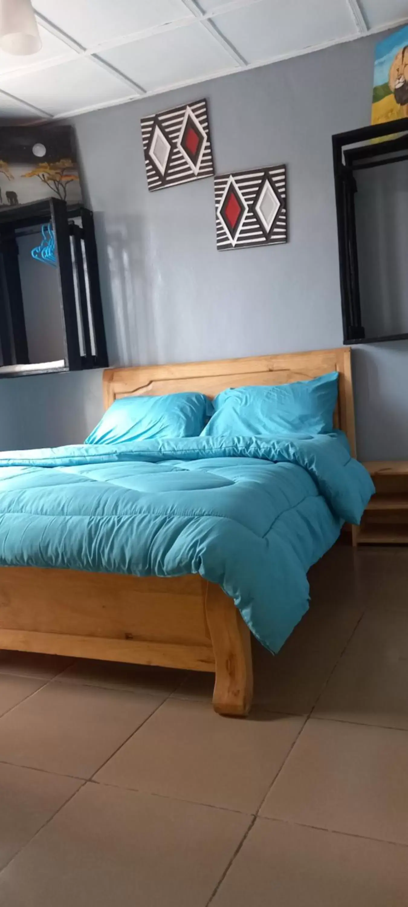 Deluxe Room (2 Adults + 1 Child) in Tommy's Budget Rooms Deluxe Room (2 Adults + 1 Child) in Tommy's Budget Rooms