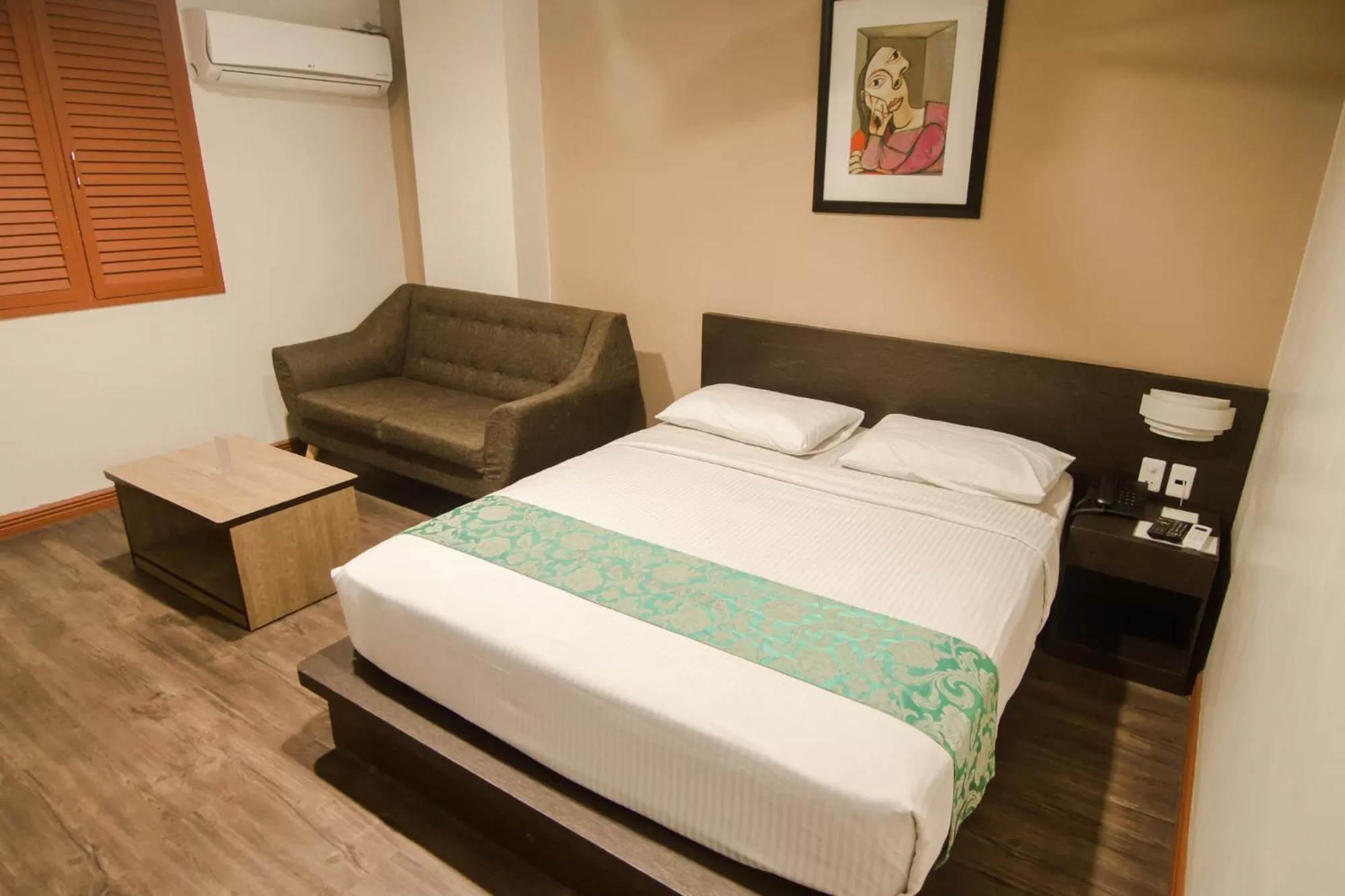 Bed in DG Grami Hotel