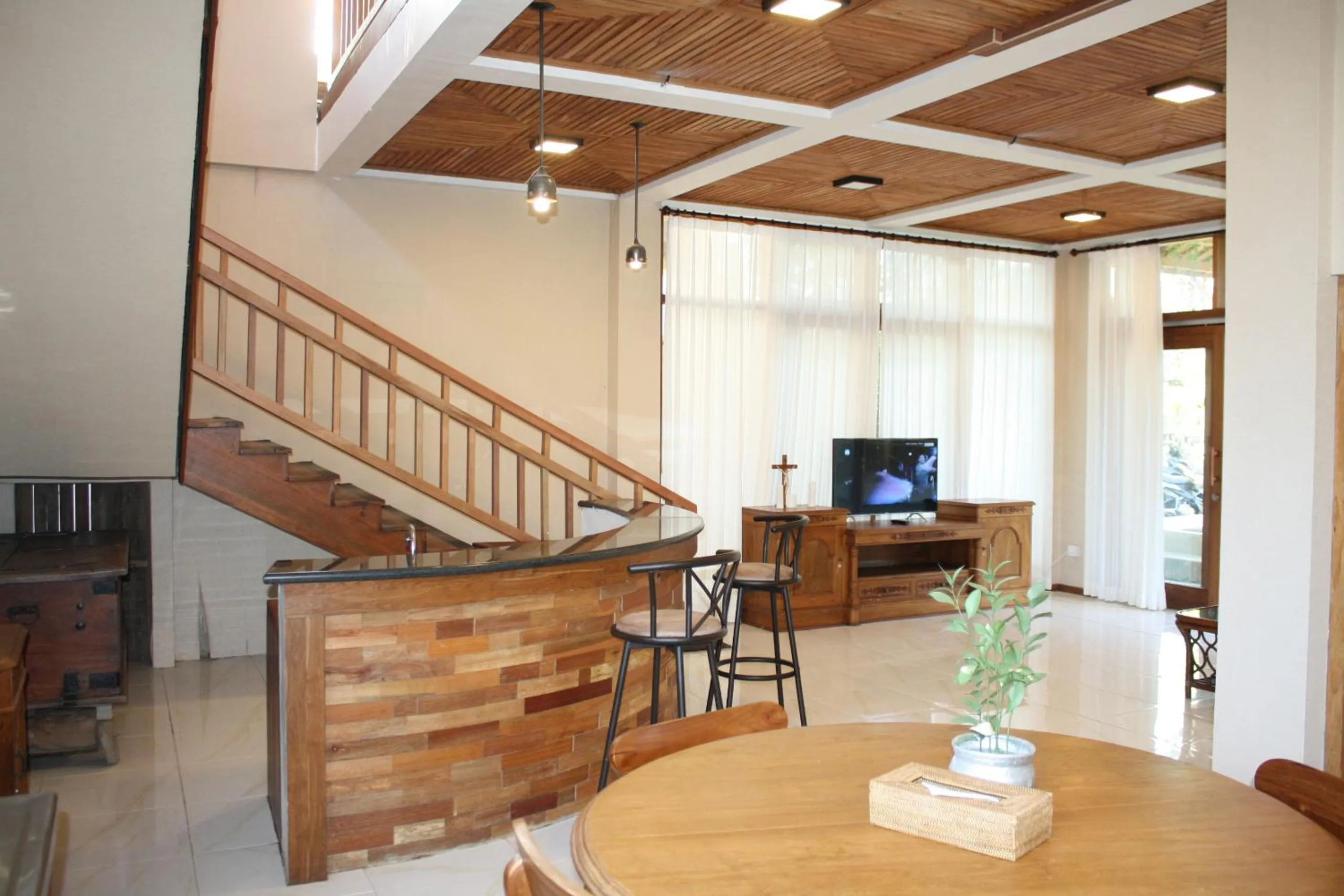 Living room in Graha Sandat Villas by GenuineHost