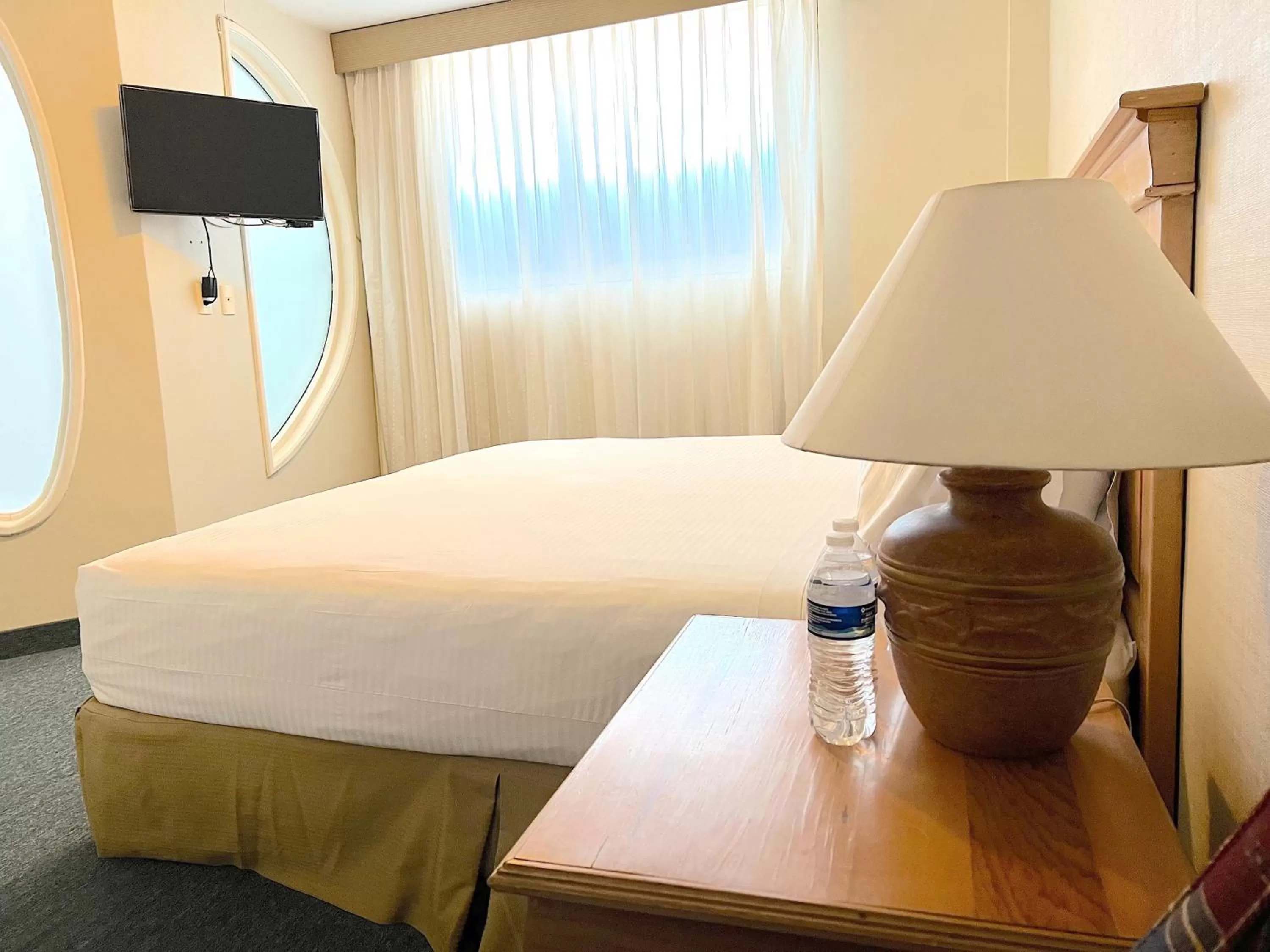 TV and multimedia, Bed in Biohotel Boutique Metepec