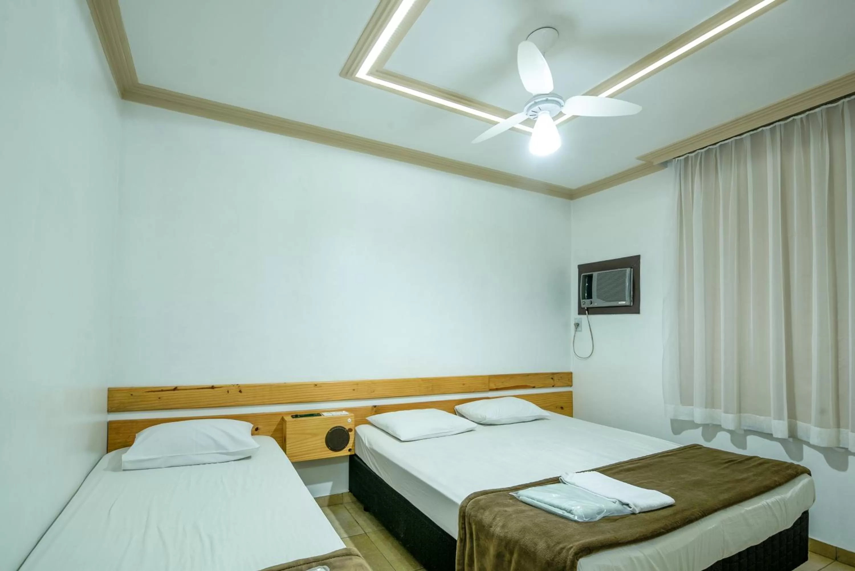 Bedroom in Classic Hotel e Motel