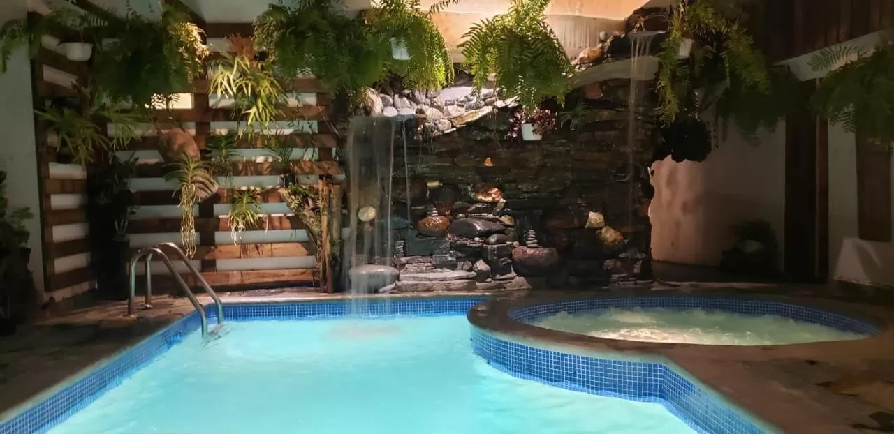 Swimming pool in Batey Hotel Boutique