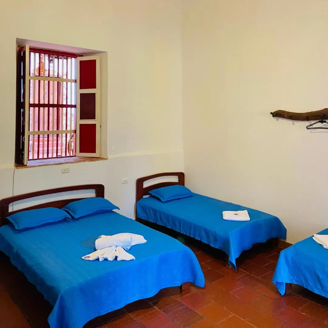 Bed in Hotel Hacienda Santa Barbara