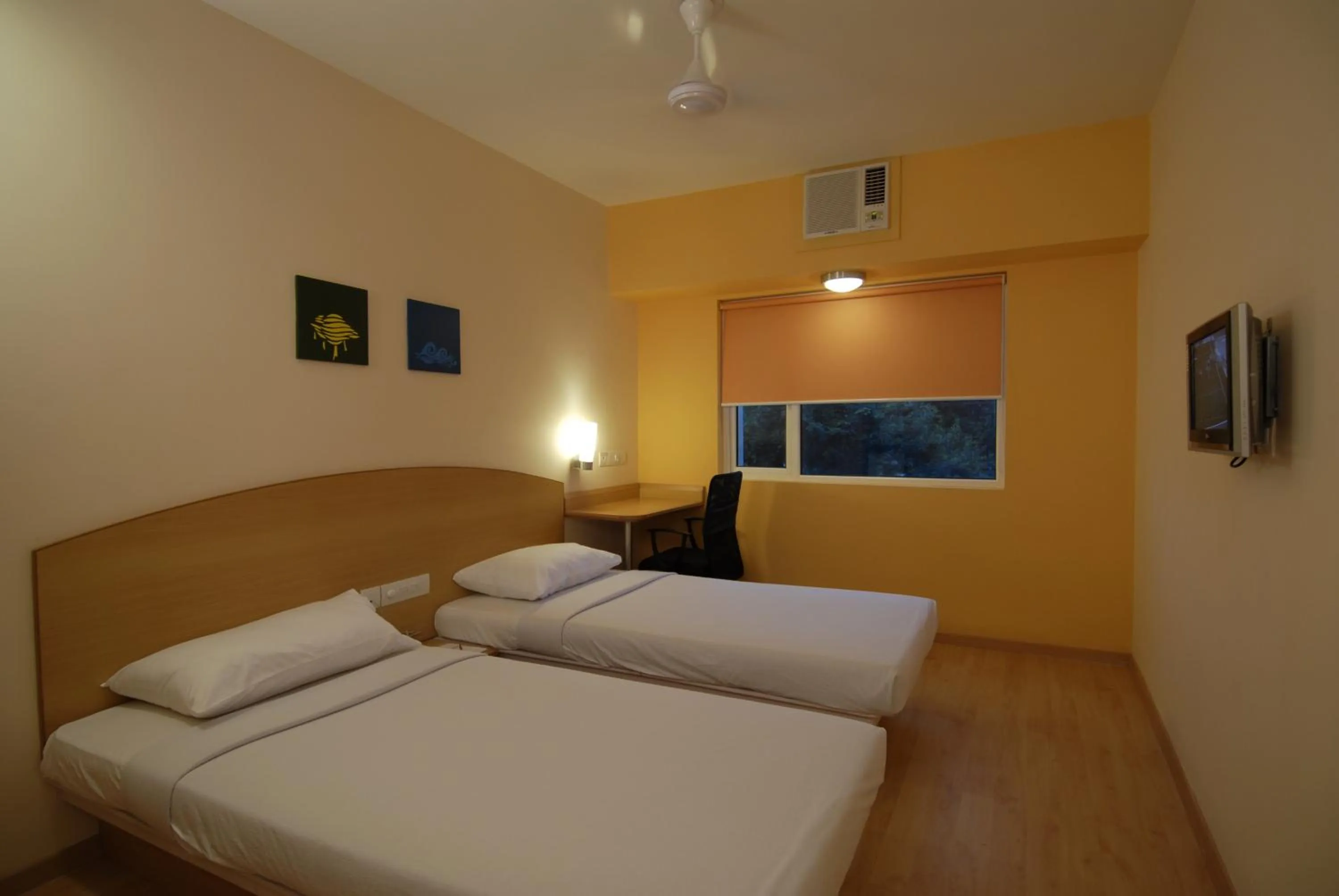 Photo of the whole room, Bed in Ginger Bhubaneshwar