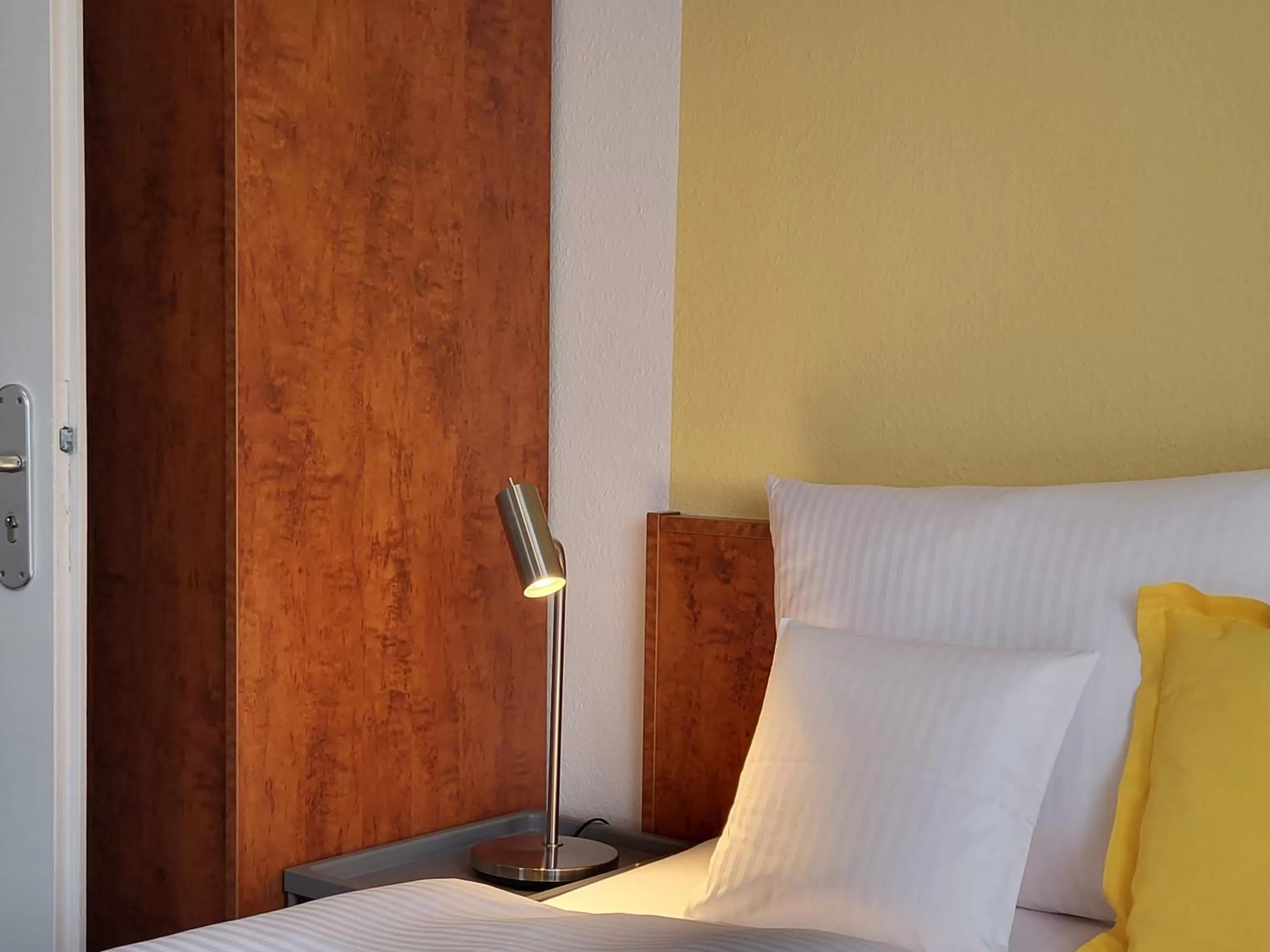 Bed in Parkhotel Am Schwanenteich