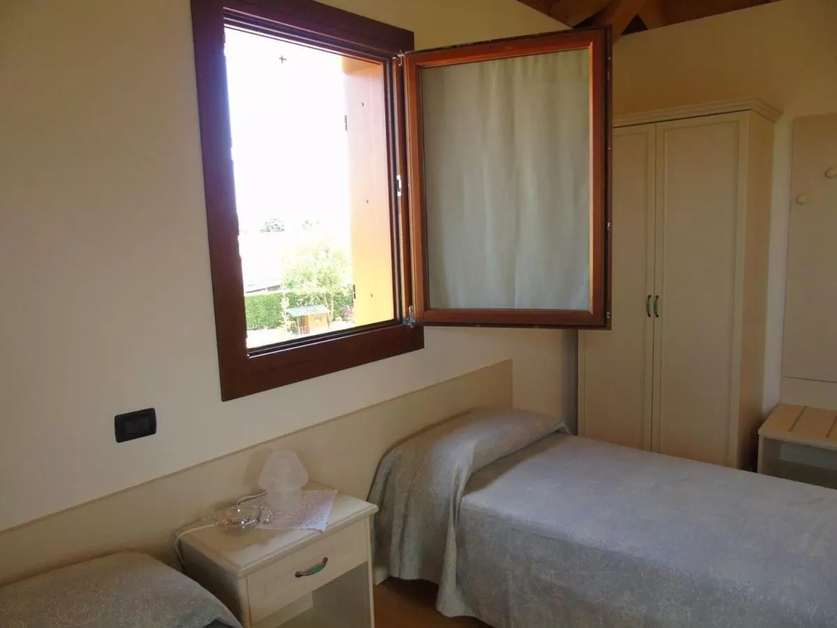 Bed in B&B Ai Cipressi