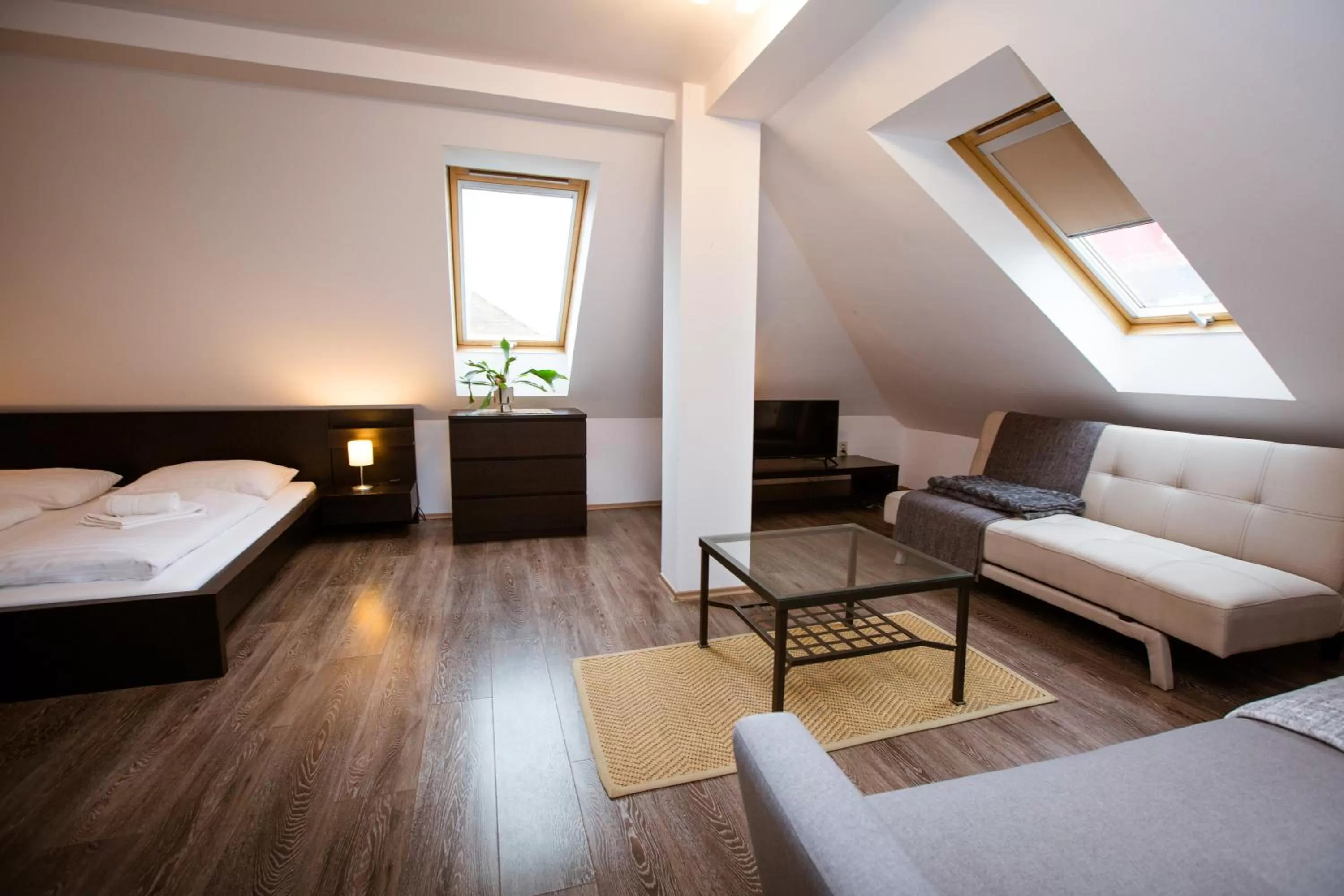 Living room, Bed in Hotel Litovel