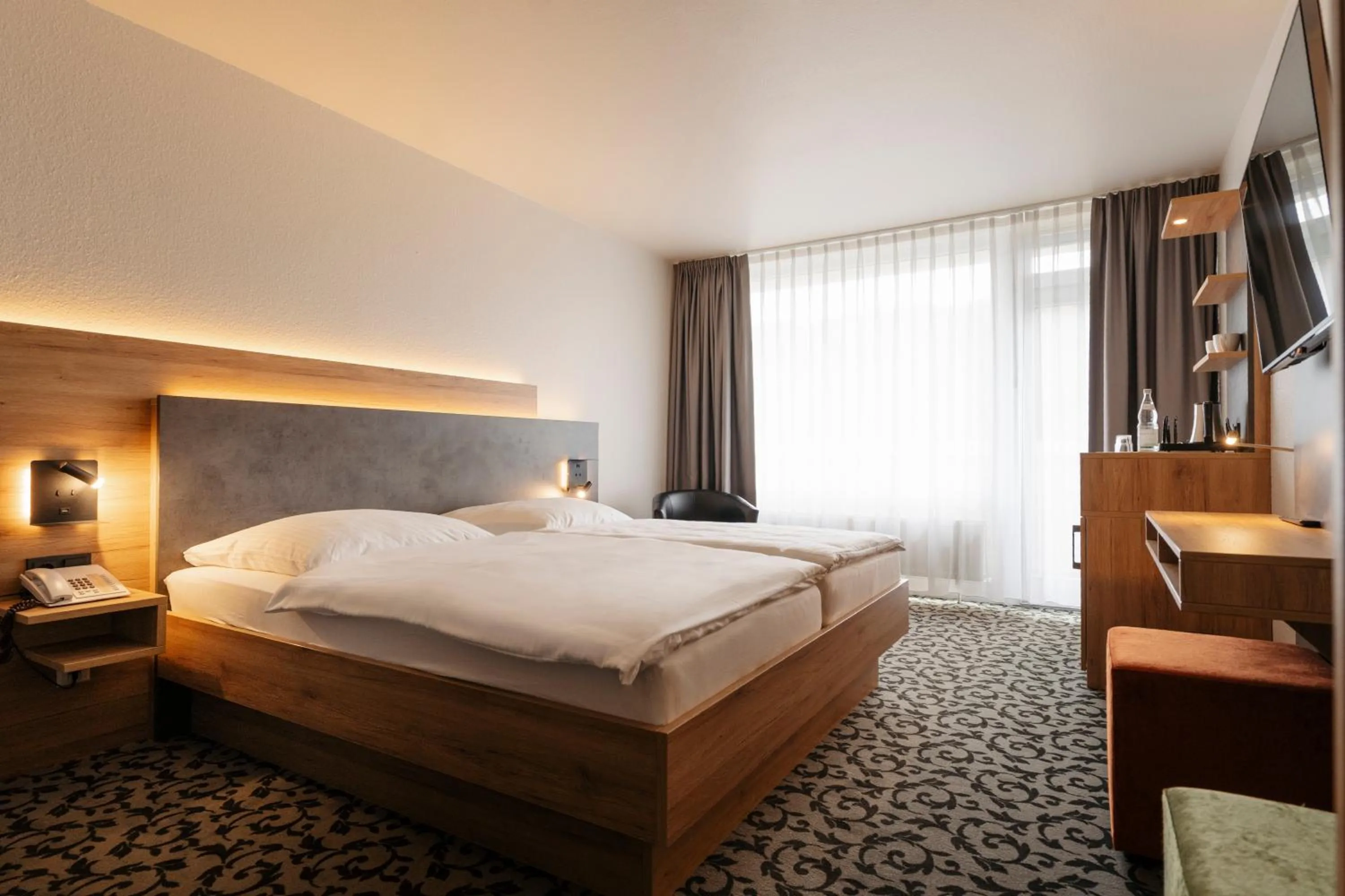 Bed in Caravelle Hotel im Park