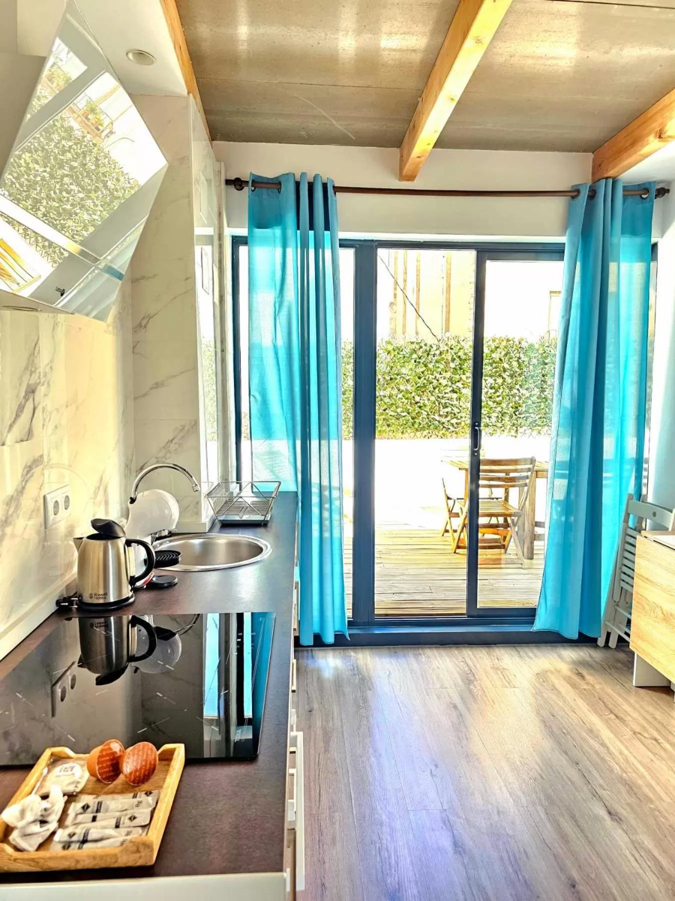 Kitchen or kitchenette in Apartamentos de la Huerta