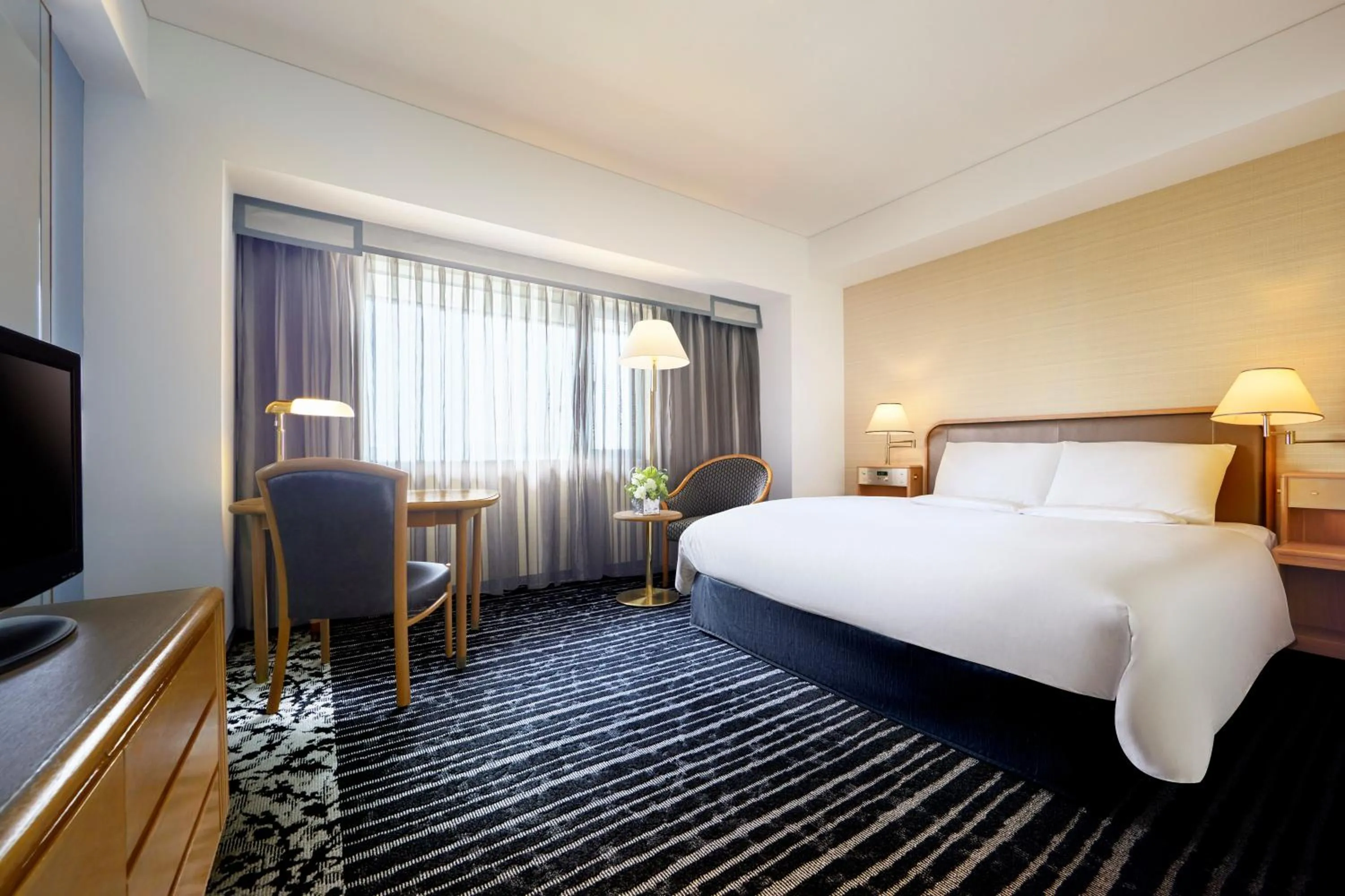 Bed in Hotel New Otani Osaka