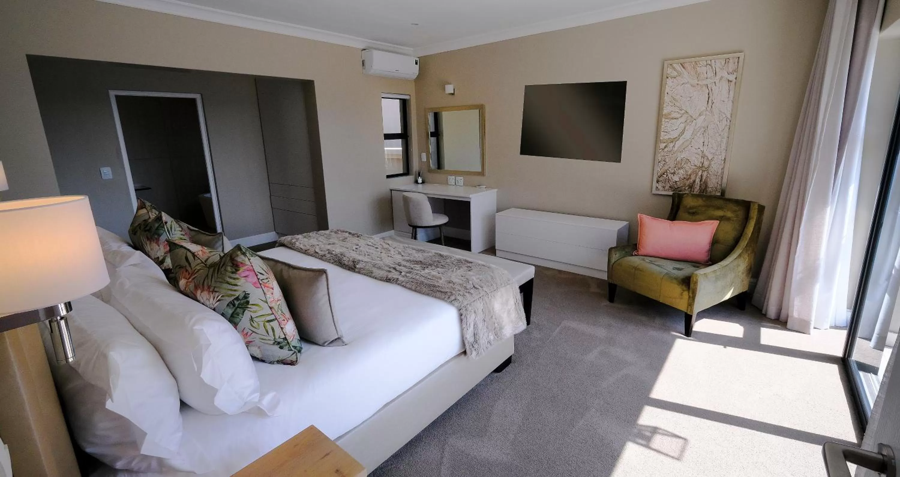Bed in The Northcliff Boutique Hotel