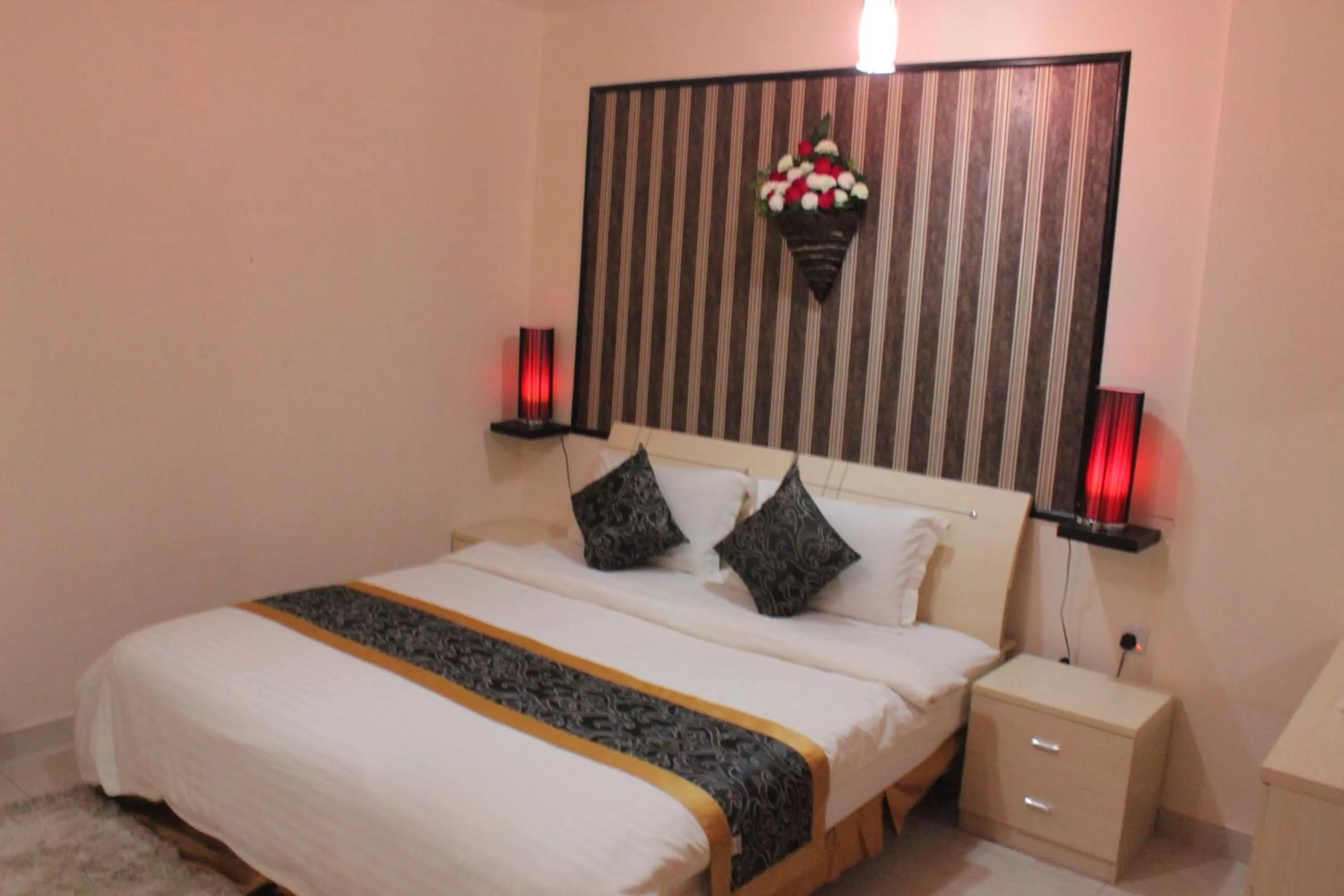 Bed in Al Amoria Apartments