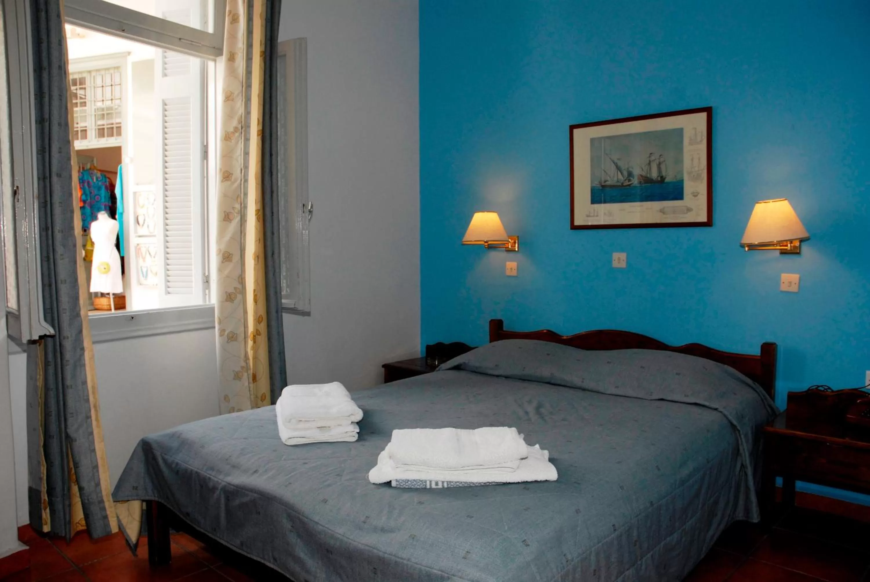 Bed in Amaryllis Hotel