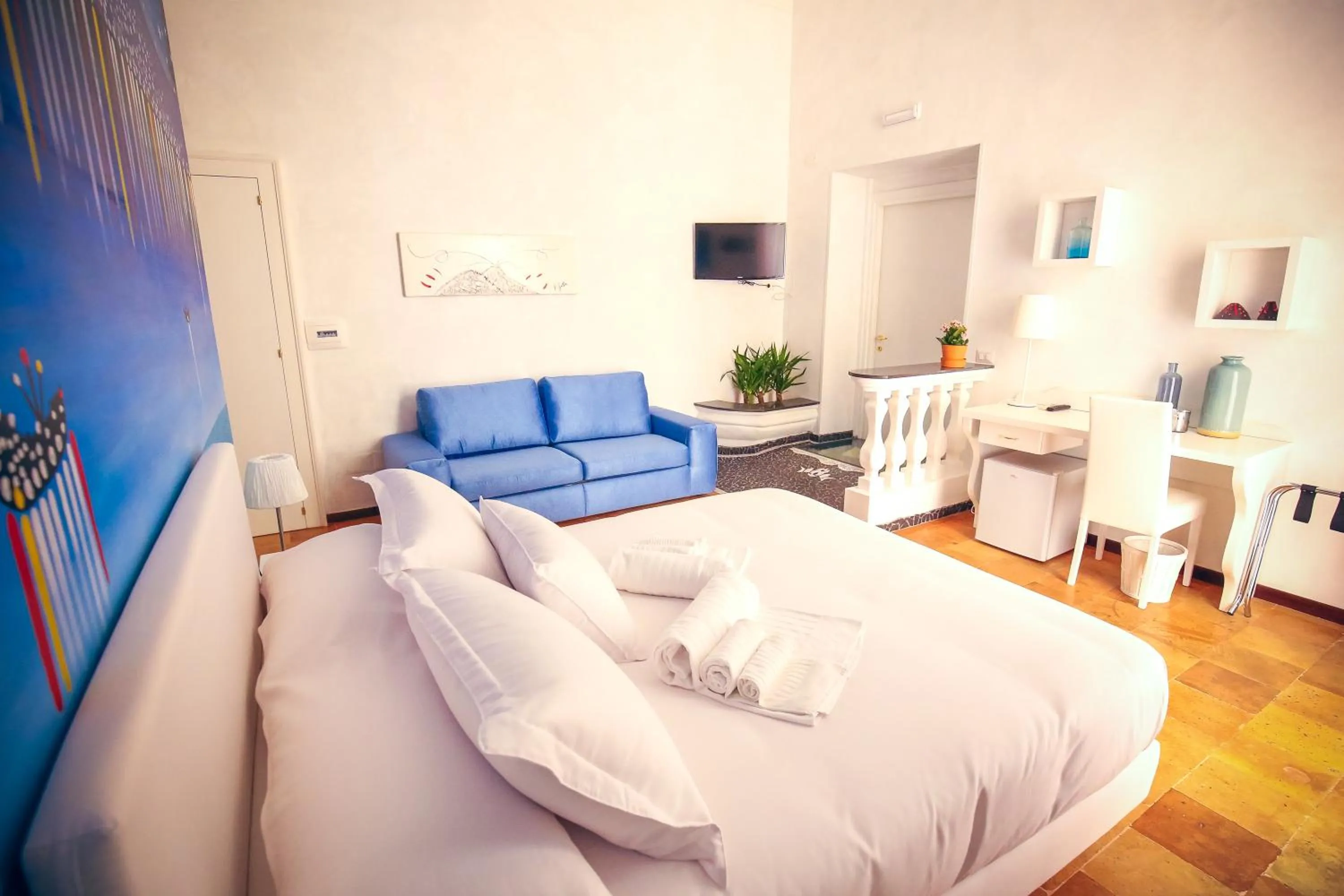 Bed in NapoliMia Boutique Hotel