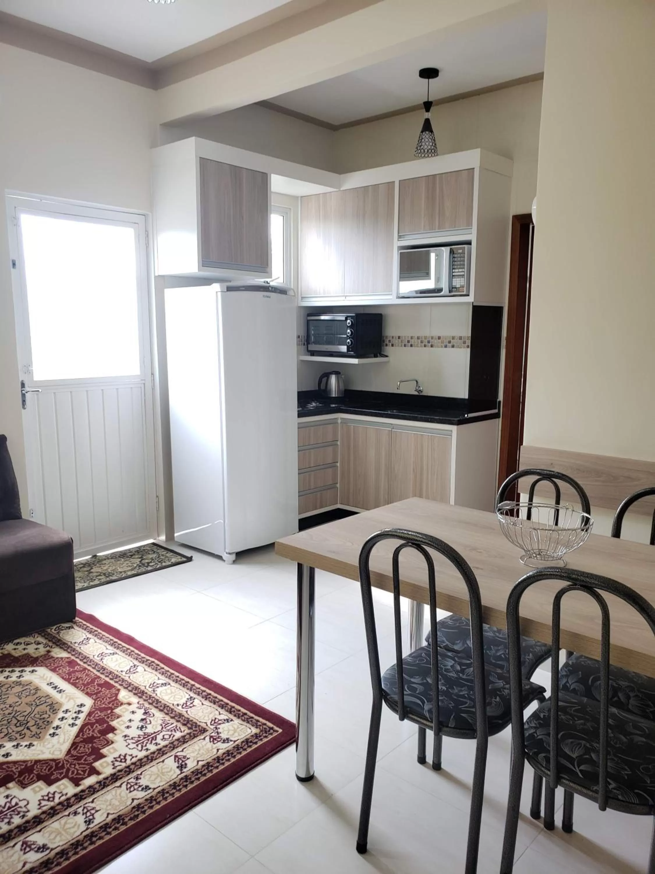 Communal kitchen in Felipe Family Houses - Casas de temporada