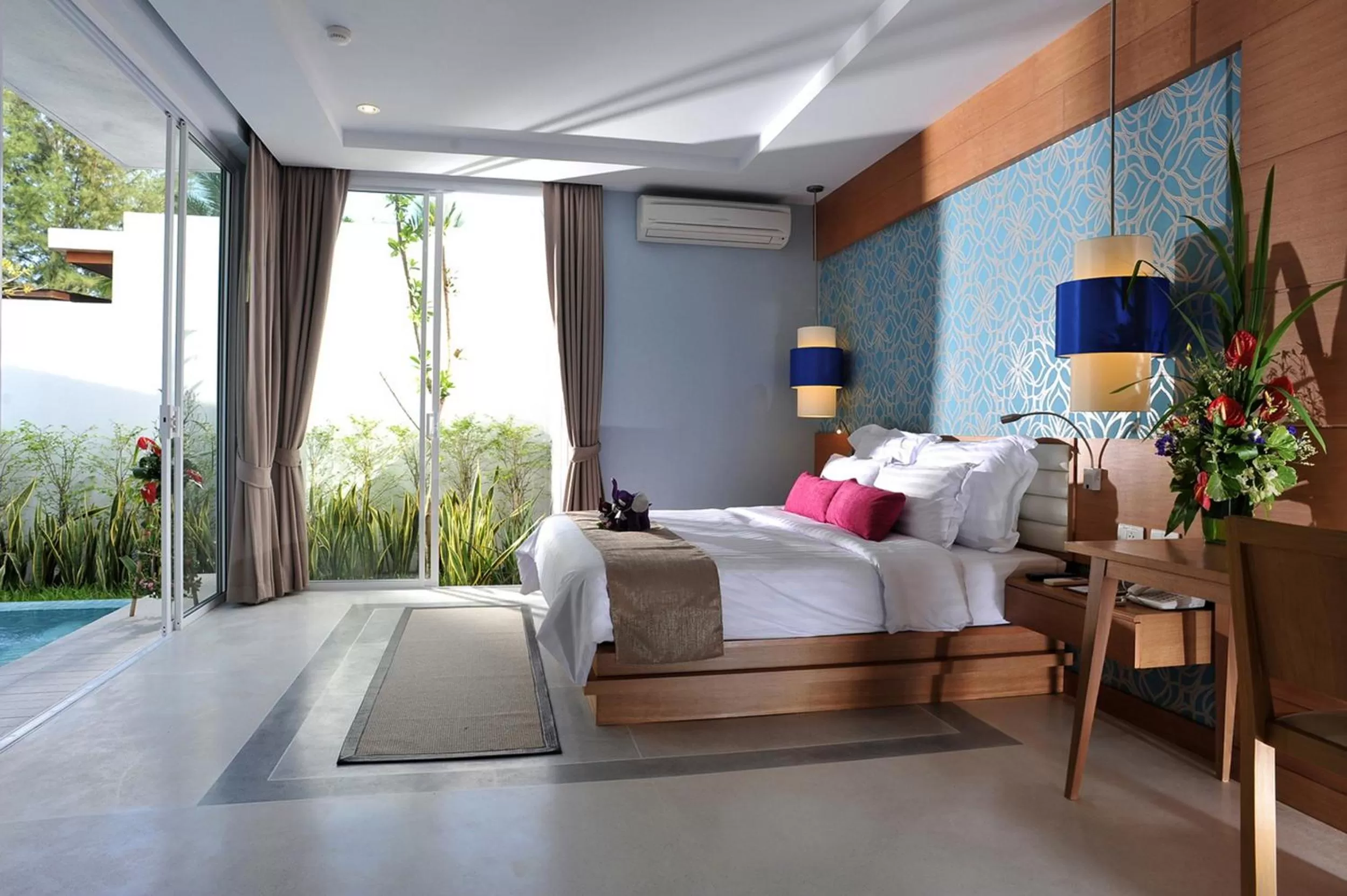 Bed in Apsara Beachfront Resort & Villa