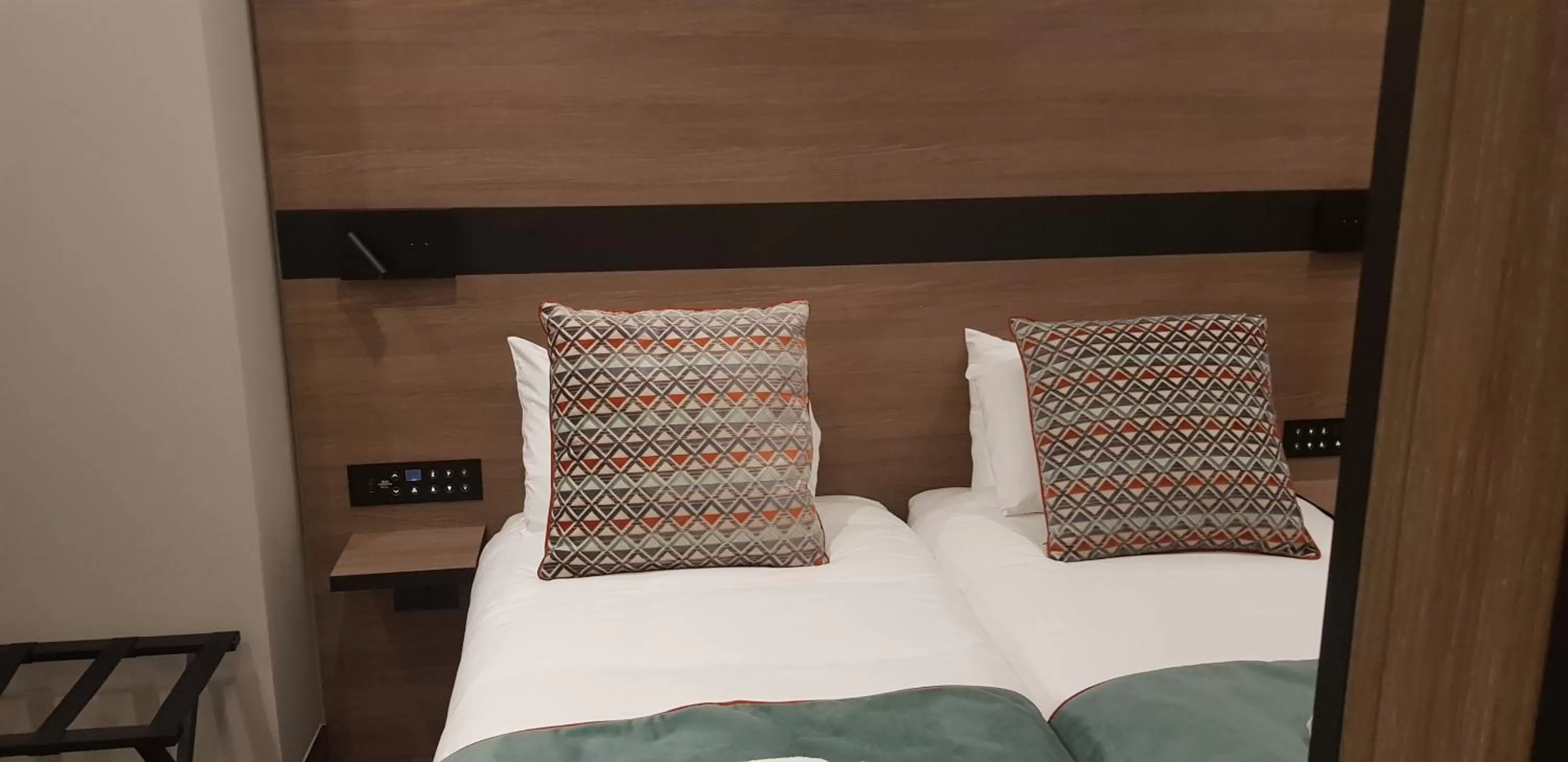 Bed in Merit Kensington Hotel