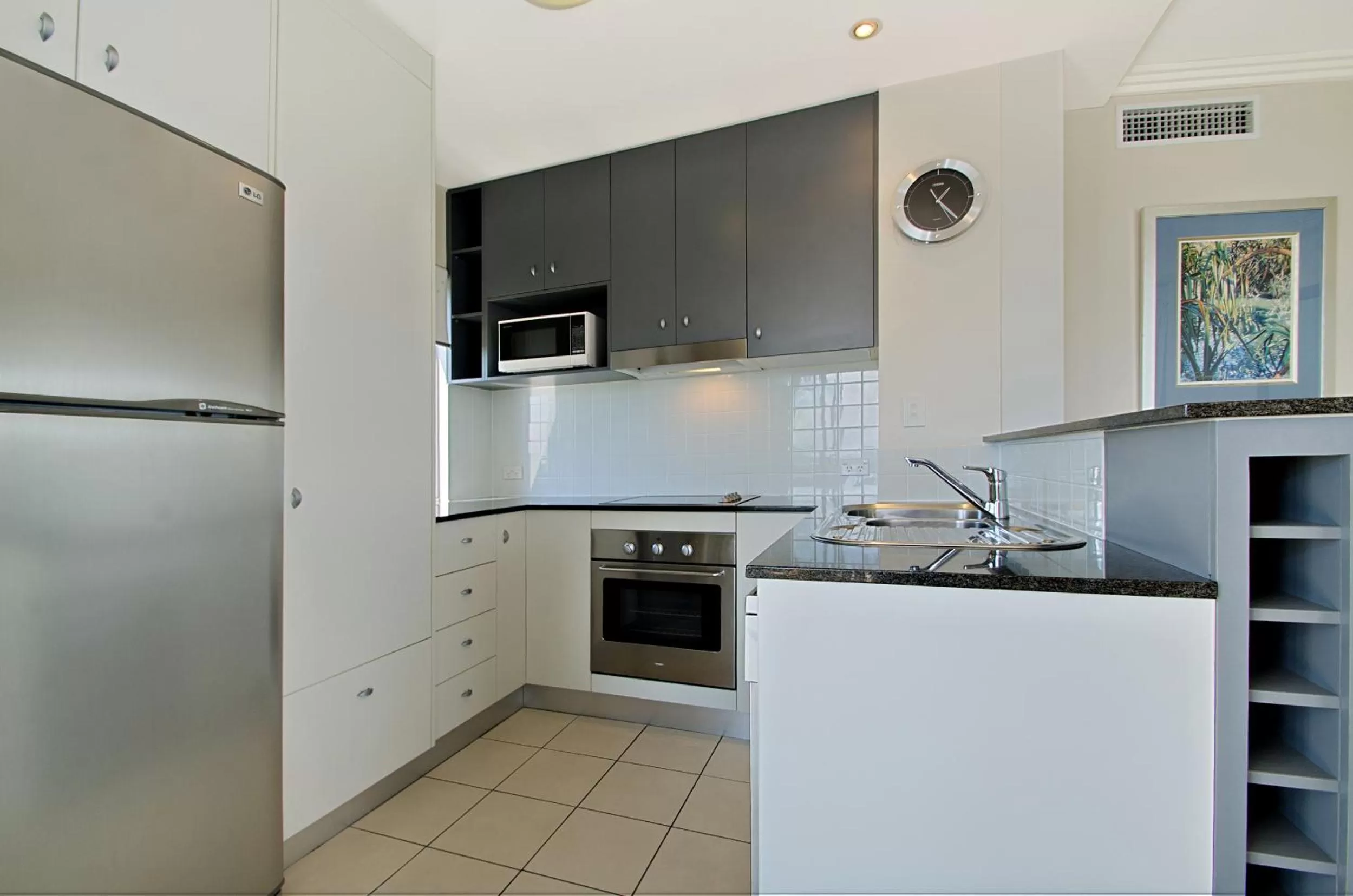 Kitchen or kitchenette in Pumicestone Blue