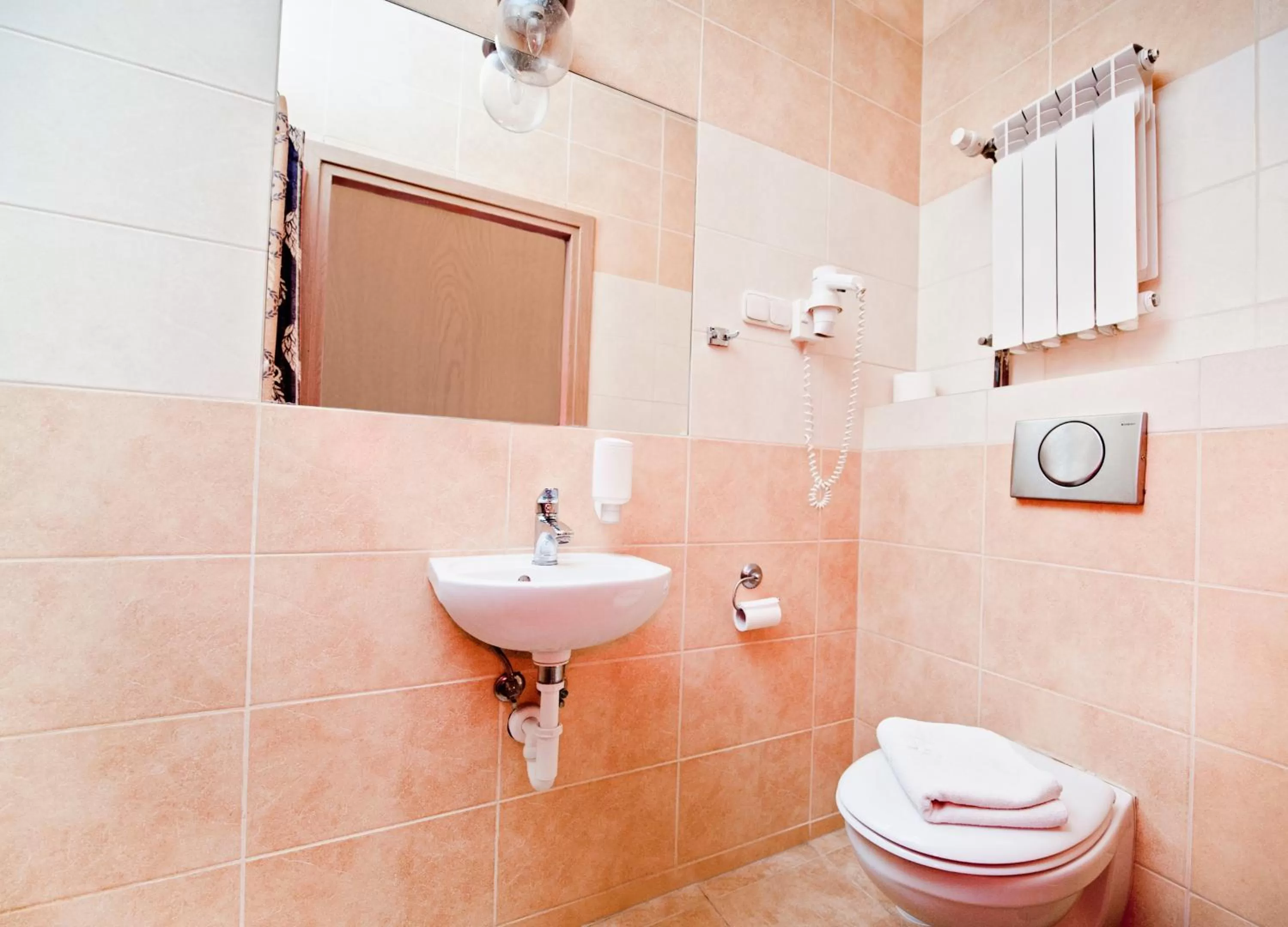 Bathroom in Miodosytnia Aparthotel