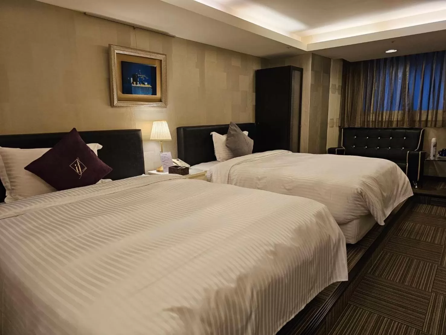 Bed in 意芙旅店 Ifinn Hotel